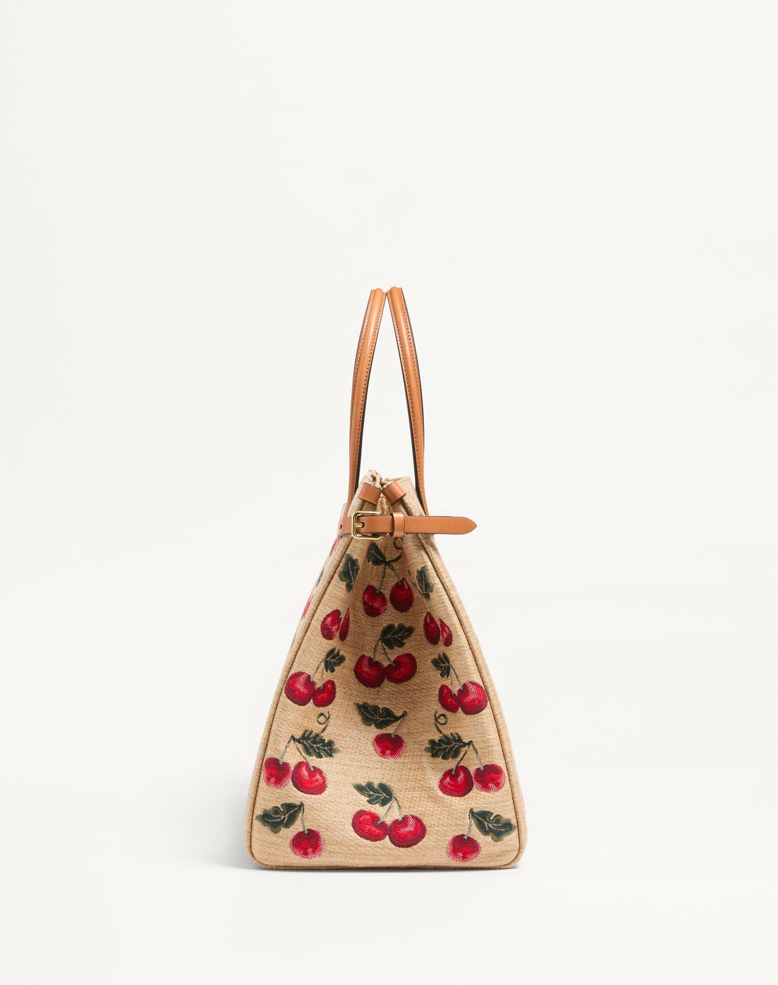 Valentino Garavani Antibes Medium Shopping Bag In Jacquard Raffia With Cherryfic Motif Product Image