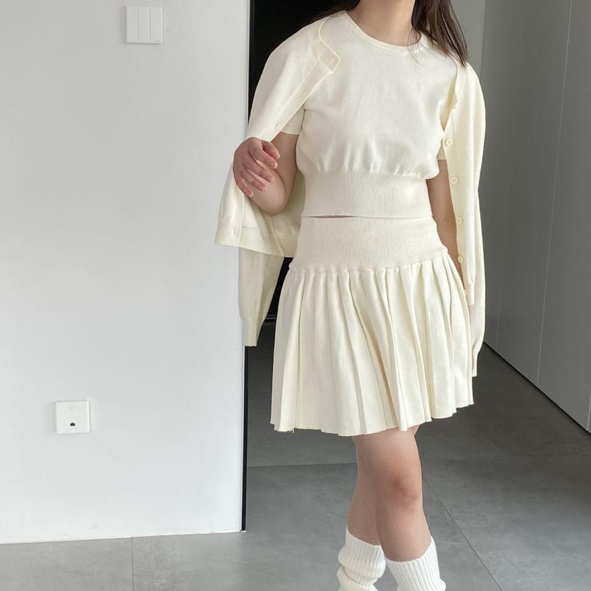 Set: Short-Sleeve Round Neck Plain Knit Top + Mid Waist Plain Mini Pleated Skirt + Round Neck Button Cardigan Product Image