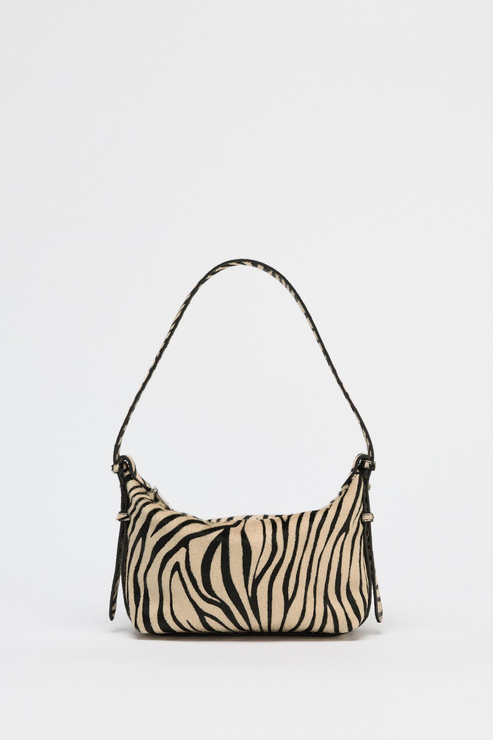 ANIMAL PRINT LEATHER AND HAIR SHOULDER BAG Product Image