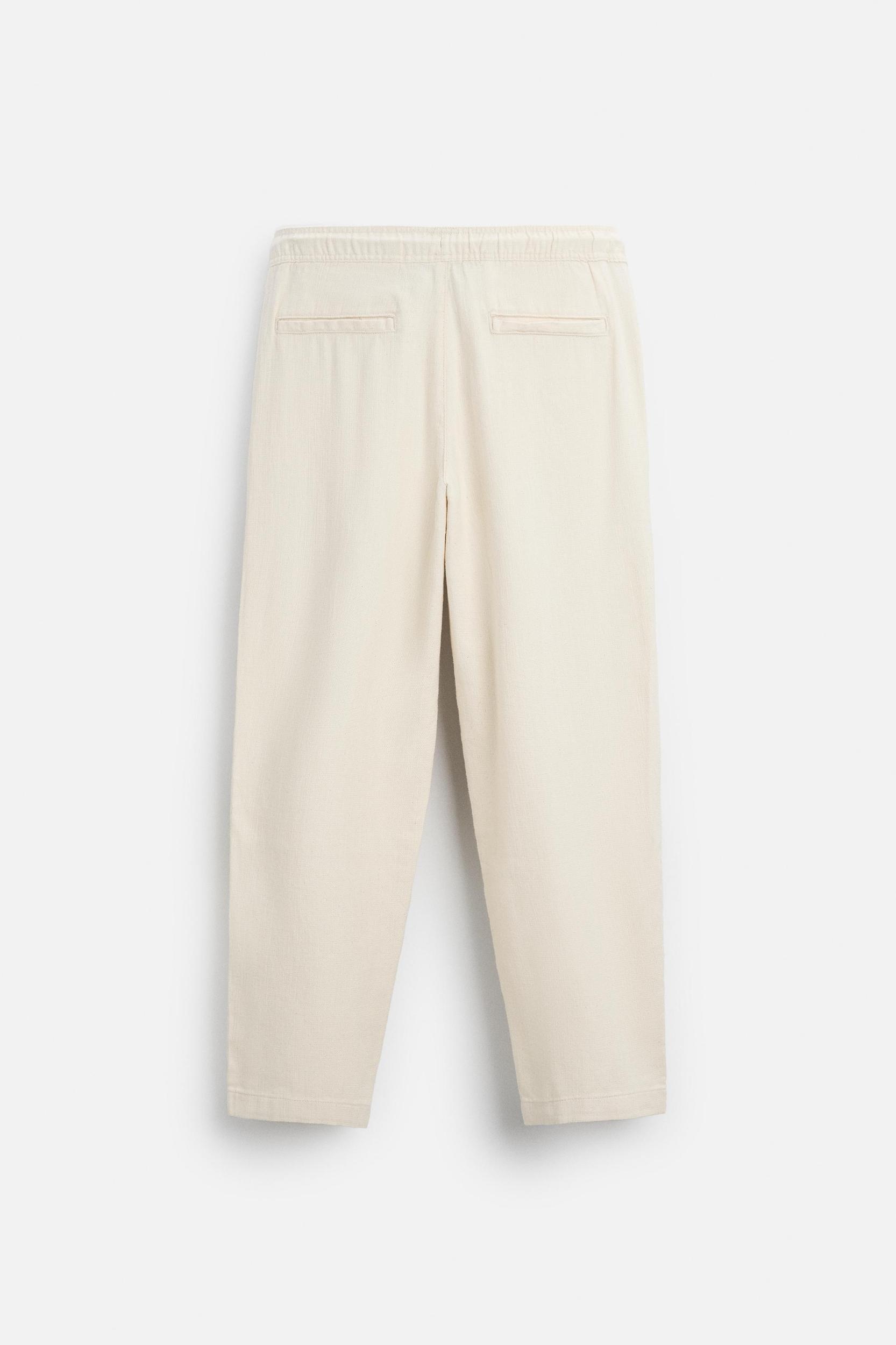TEXTURED RELAXED FIT PANTS Product Image