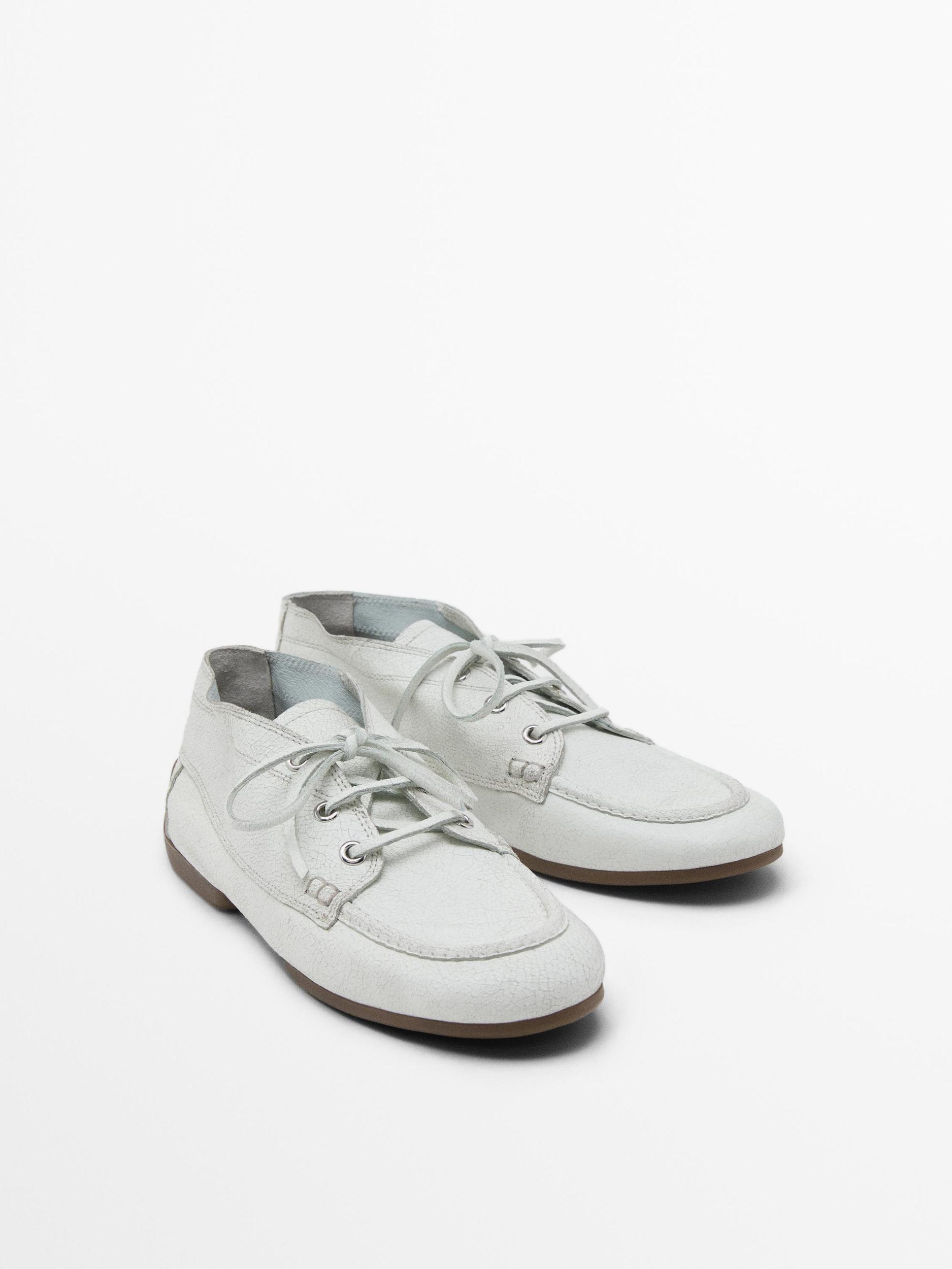 Crackled leather boot-style deck shoes Product Image