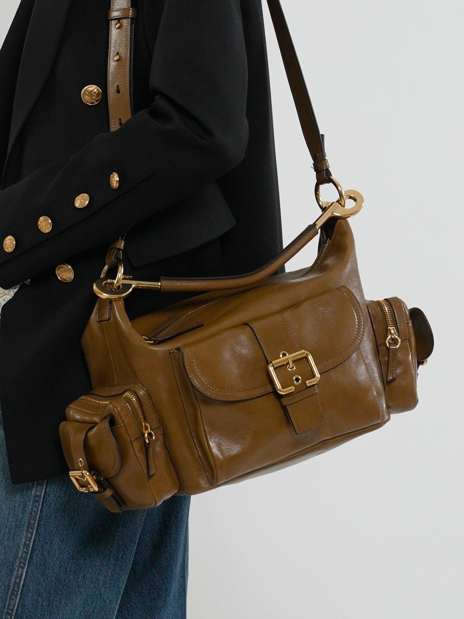 Camera bag in shiny leather Product Image