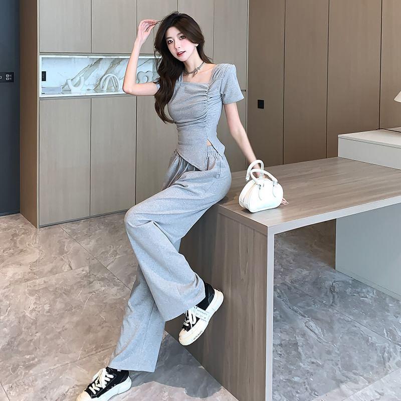Set: Short-Sleeve Asymmetrical Neck Ruched Slit Slim Fit T-Shirt + Drawstring Waist Loose Fit Sweatpants Product Image
