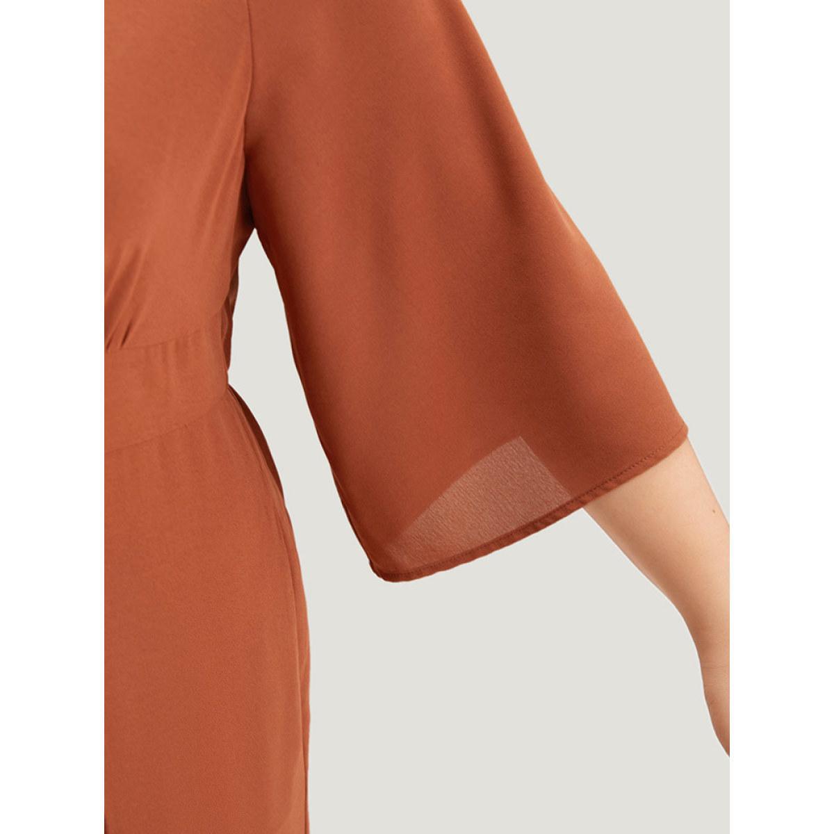 Plus Size Brown Plain Crisscross Plicated Detail Flutter Sleeve Jumpsuit Women Elegant Elbow-length sleeve V-neck Dailywear Loose Jumpsuits BloomChic 30/6X Product Image