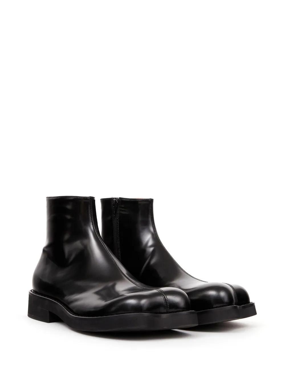 Trunk leather ankle boots Product Image