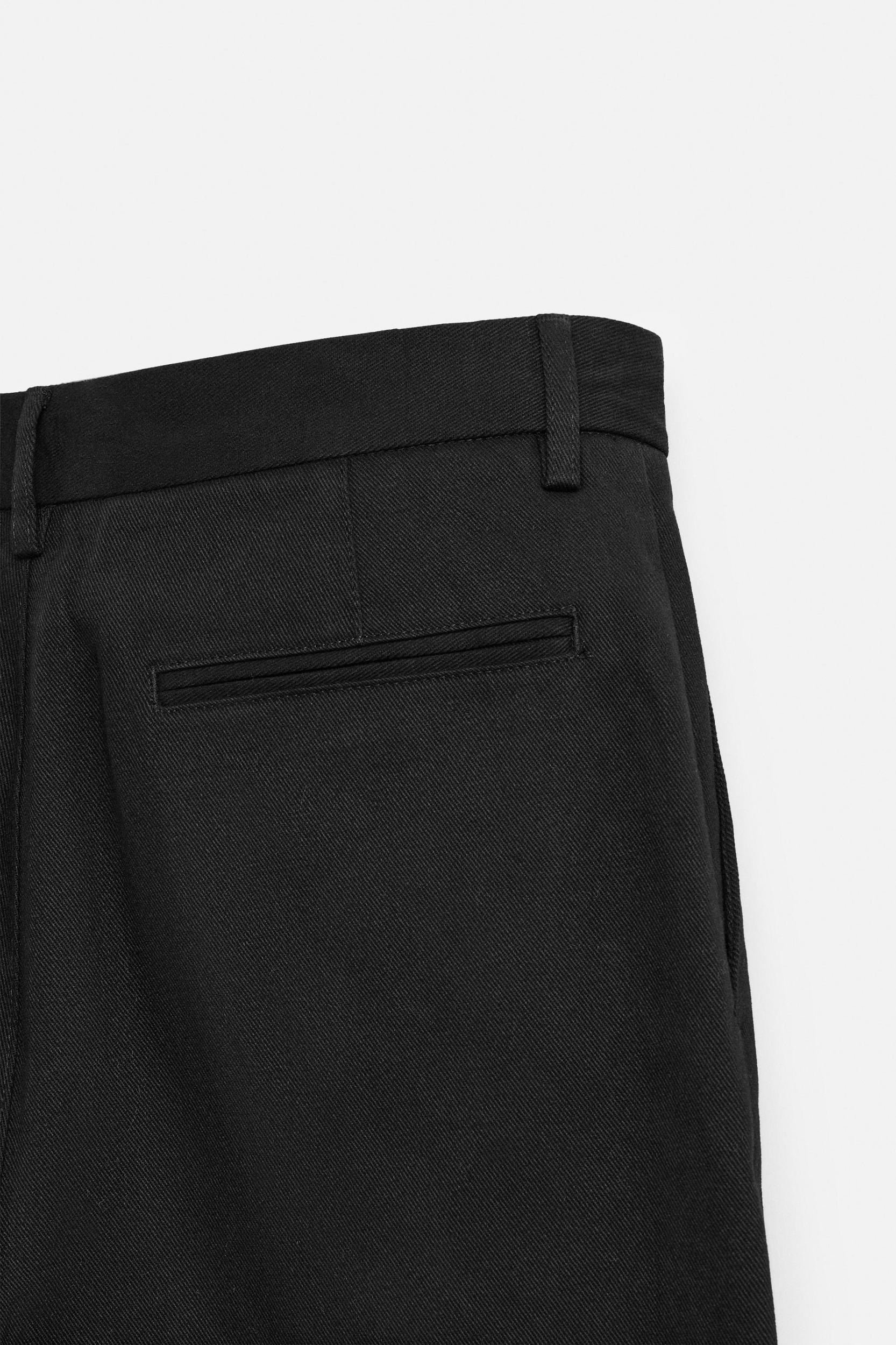 BALLOON FIT PLEATED PANTS Product Image