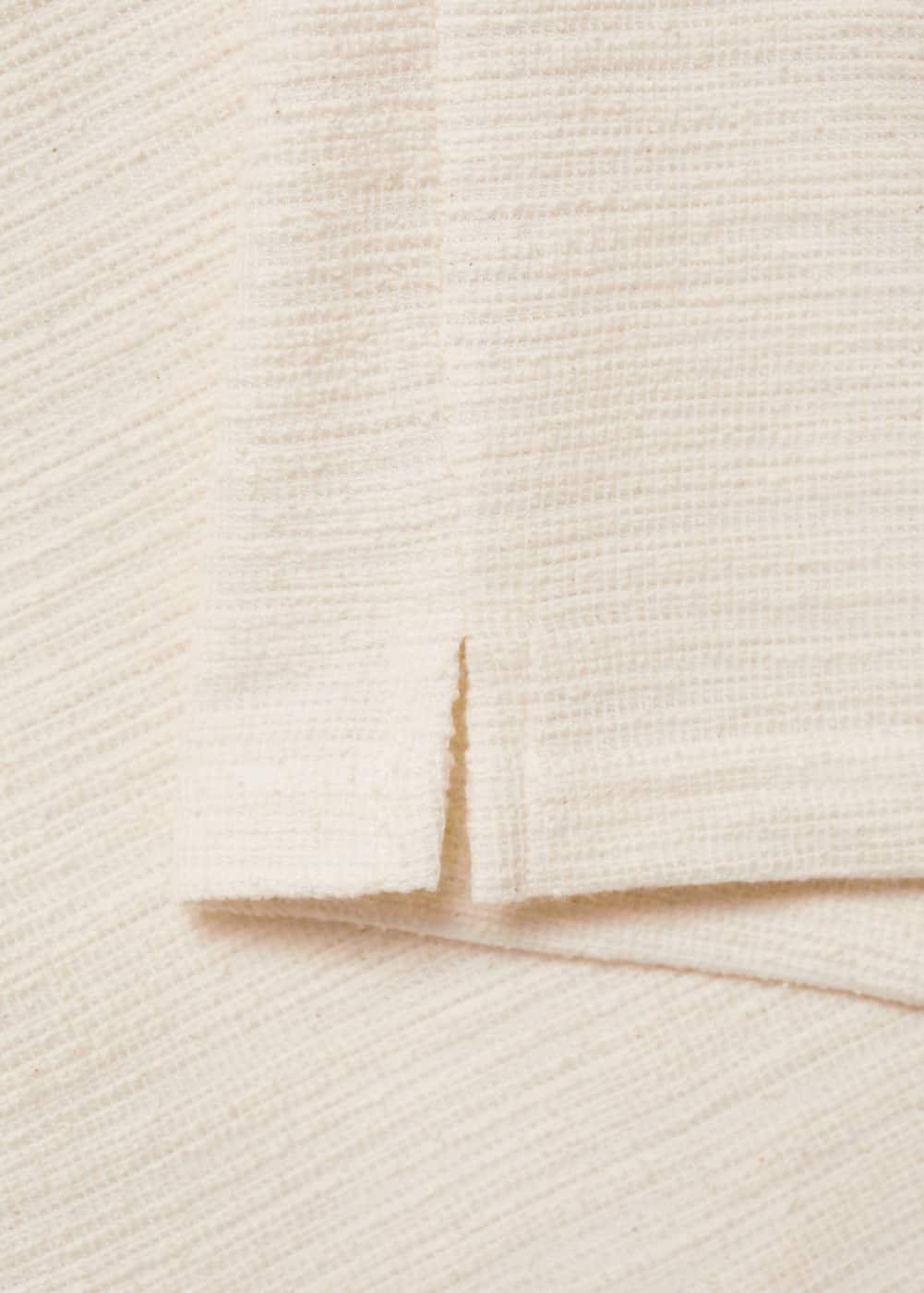 Regular-fit textured knitted polo shirt - Men | MANGO USA Product Image