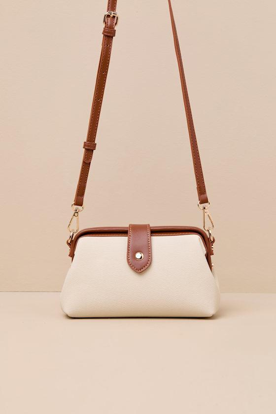 Dovelyn Cream and Brown Canvas Crossbody Bag Product Image