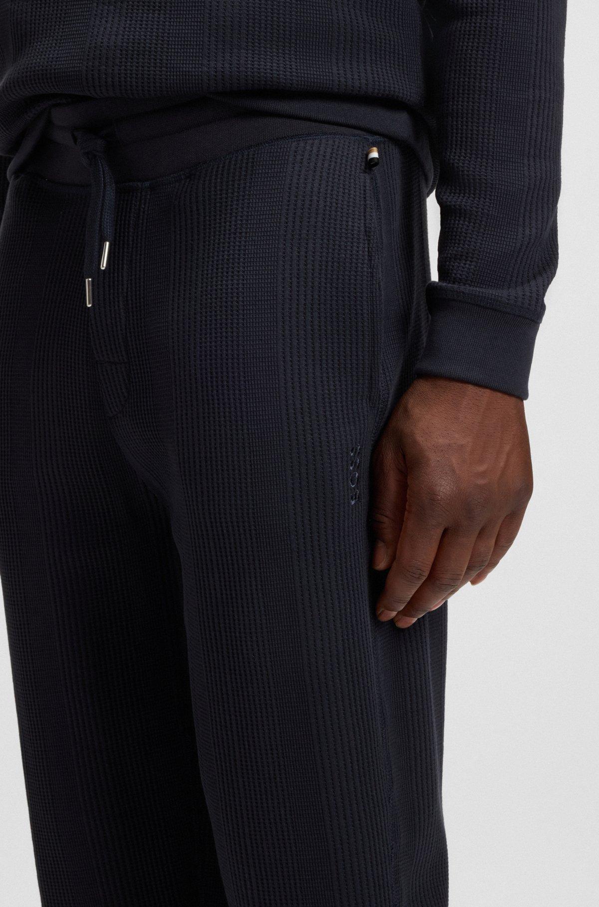 Cotton tracksuit bottoms with embroidered logo Product Image