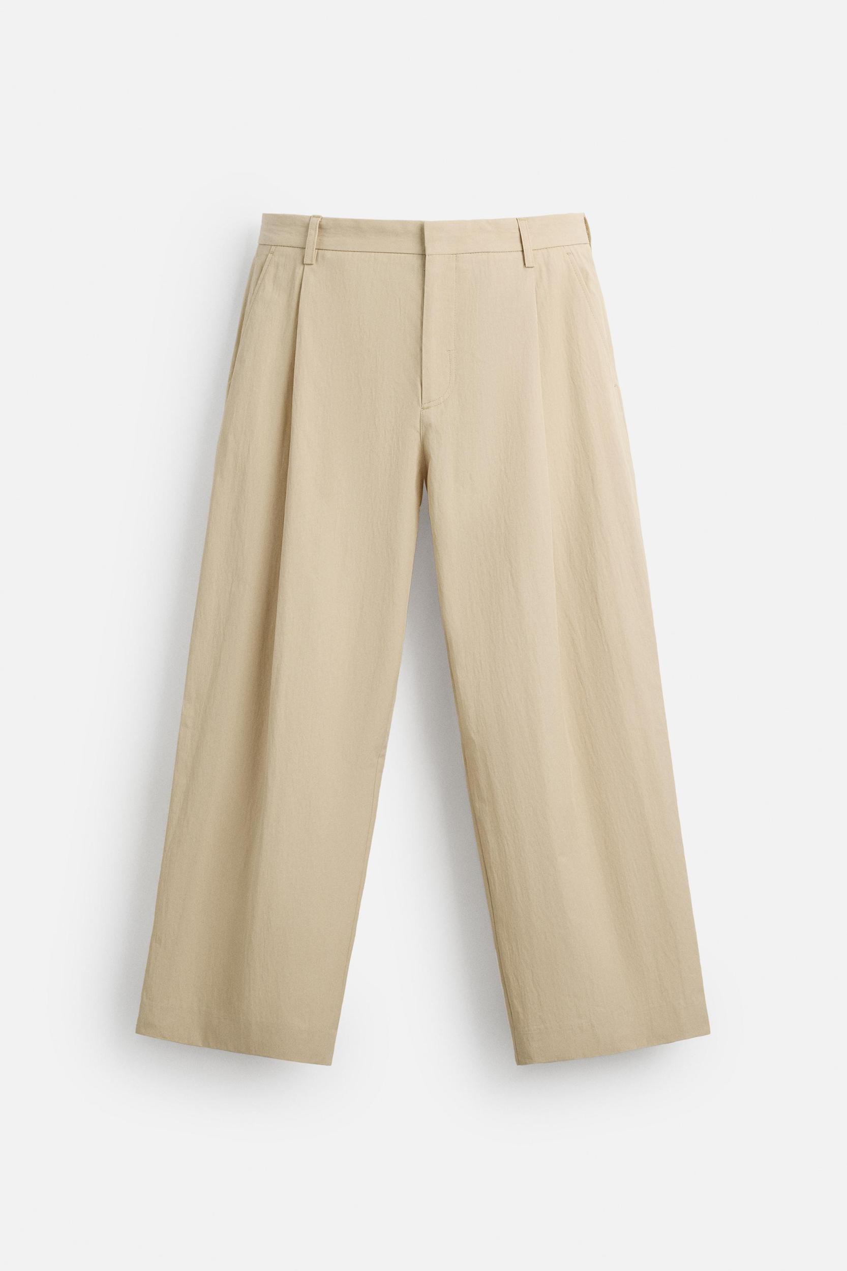 LIMITED EDITION RELAXED FIT PLEATED PANTS Product Image