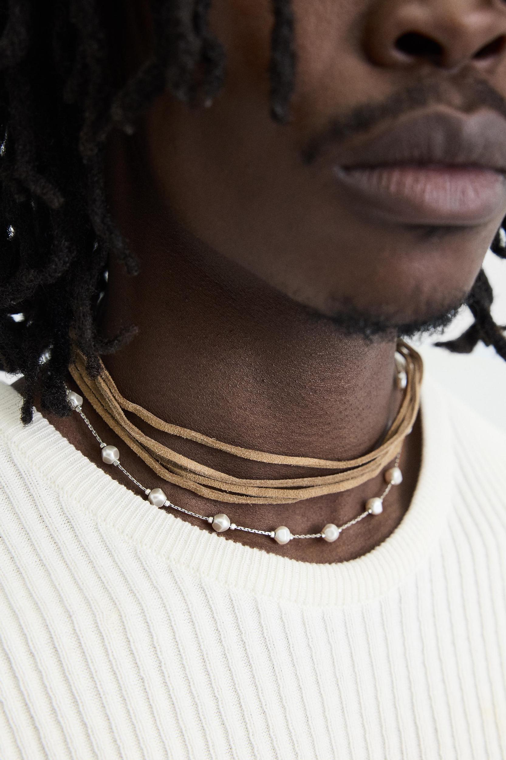 FAUX LEATHER COMBINATION NECKLACE Product Image