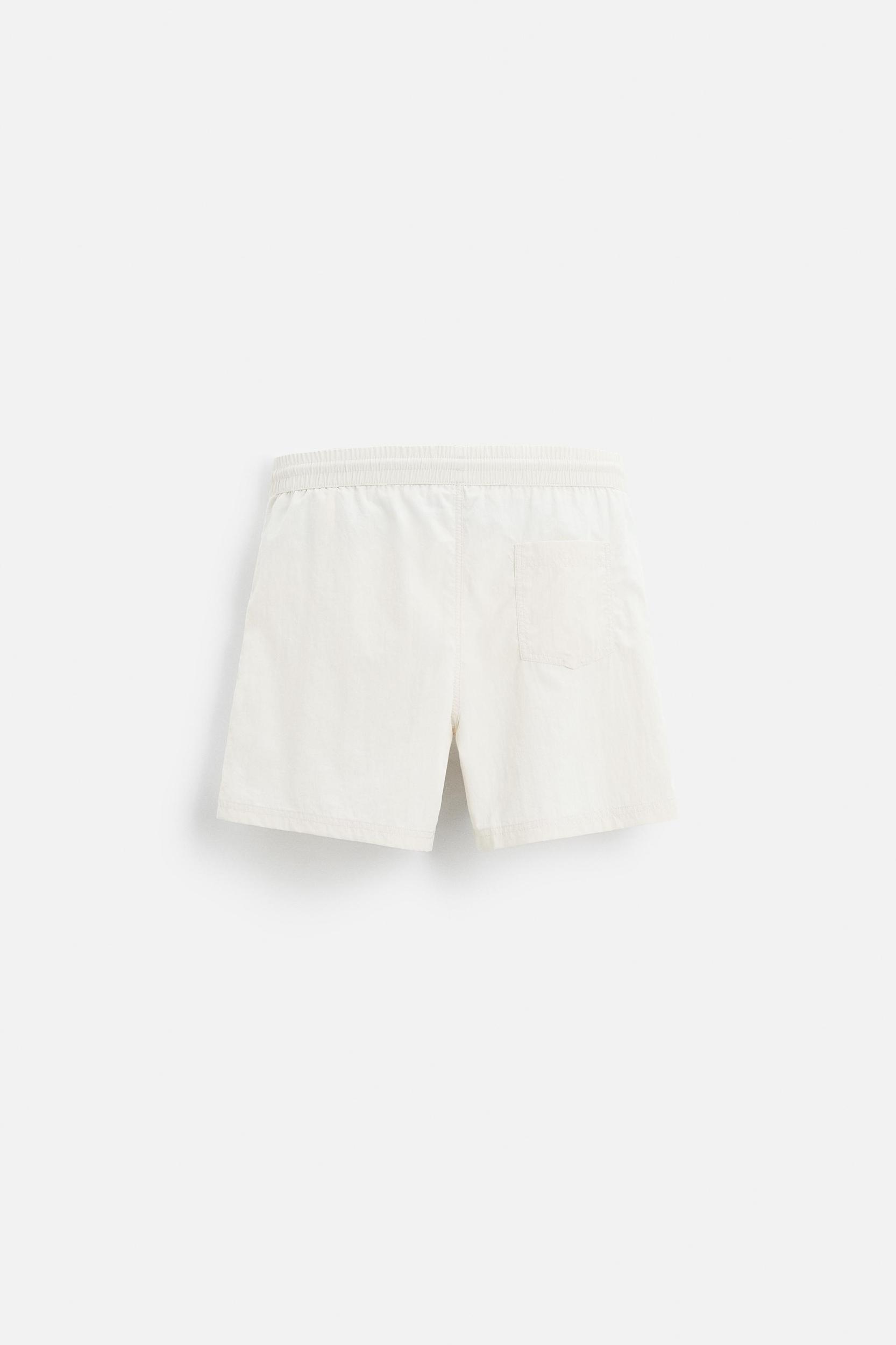 BASIC MID-LENGTH SWIMSUIT Product Image