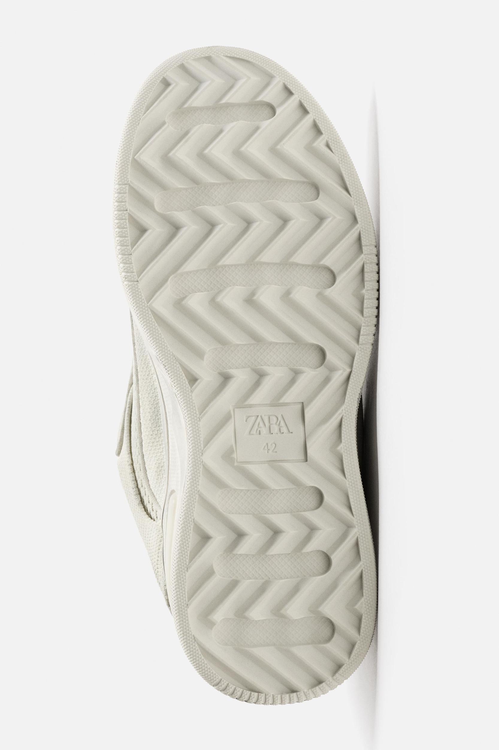 DISTRESSED THICK-SOLED SNEAKERS Product Image
