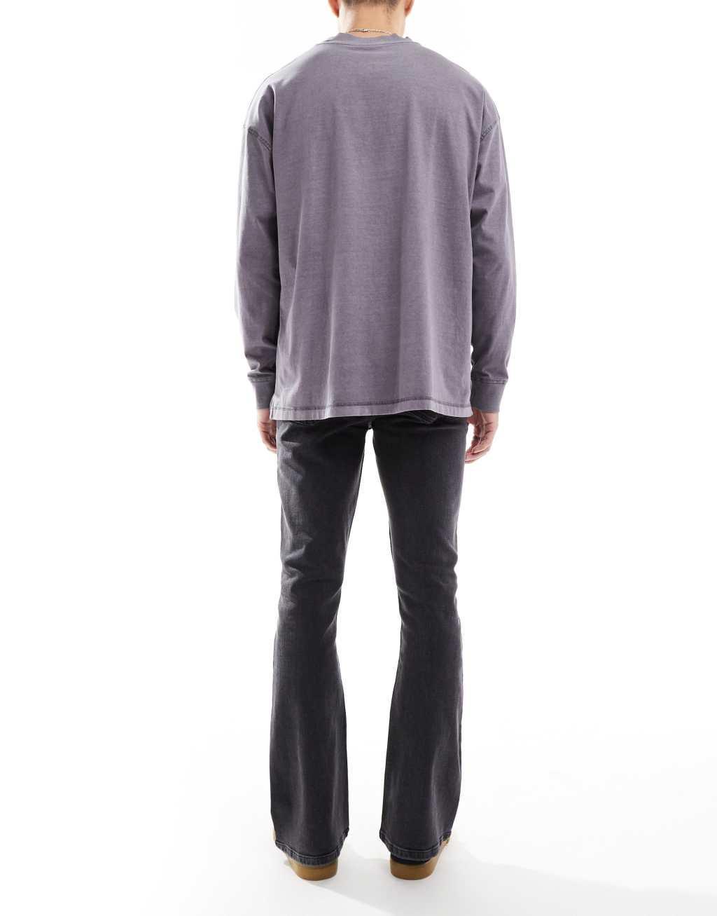 ASOS DESIGN flared jeans in washed black Product Image