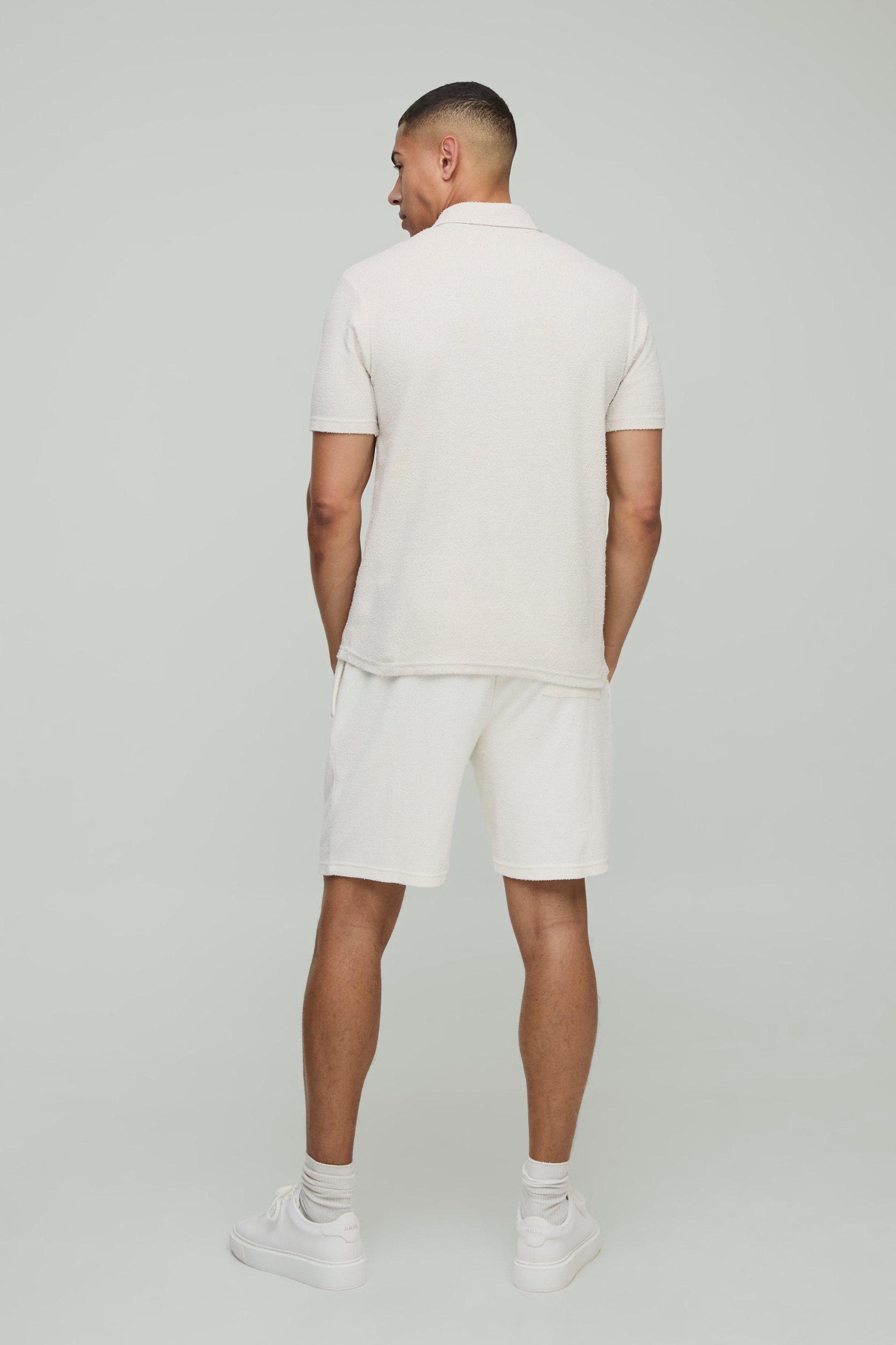 Regular Fit Natural Texture Concealed Placket Polo | boohooMAN USA Product Image