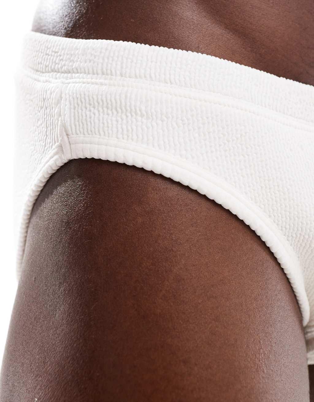 ASOS DESIGN crinkle swim briefs in white Product Image