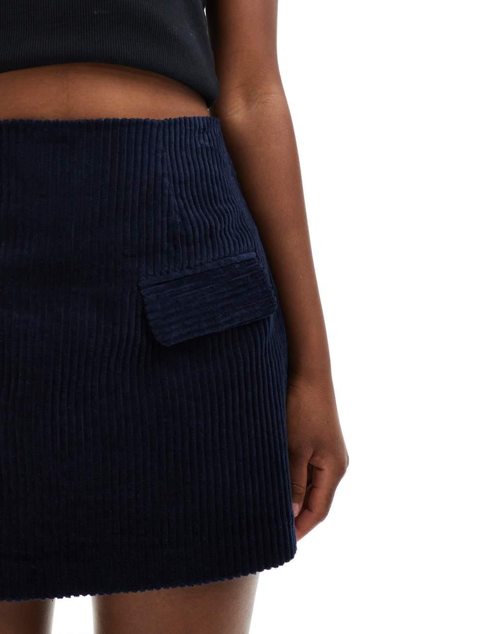 ASOS DESIGN pocket detail cord skirt in navy Product Image