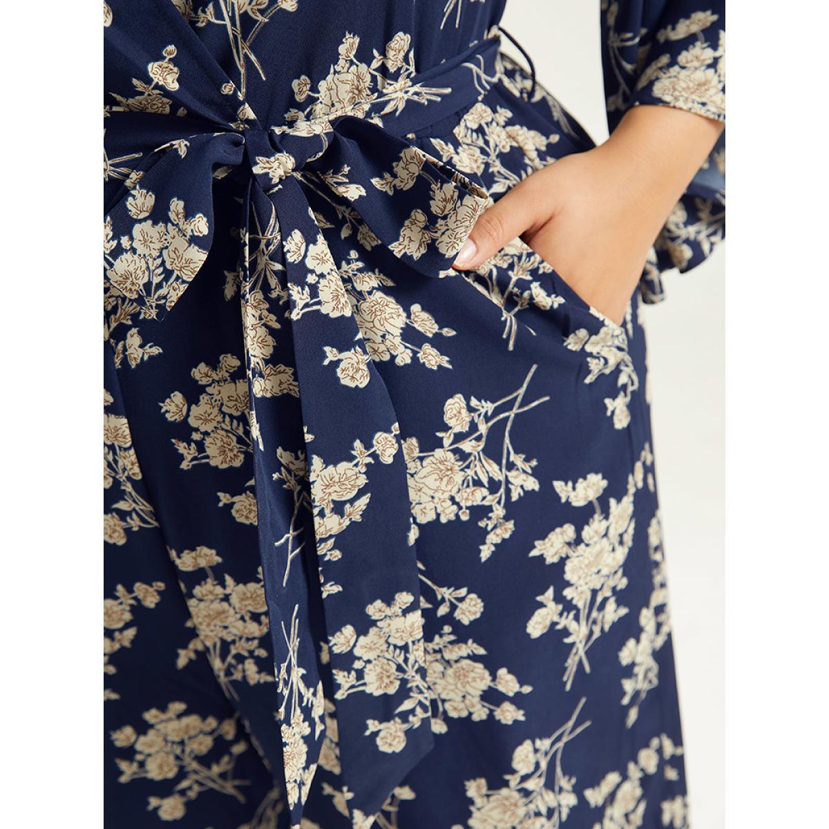 Plus Size DarkBlue Floral Print Bell Sleeve Pocket Belted Jumpsuit Women Elegant Elbow-length sleeve V-neck Dailywear Loose Jumpsuits BloomChic 14-16/1X Product Image