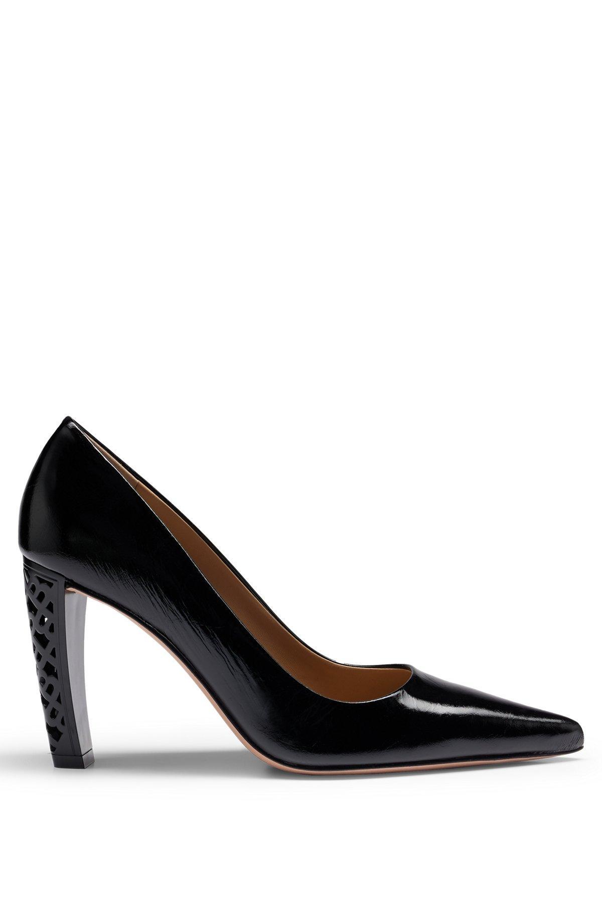 Leather pumps with monogram-patterned heels Product Image