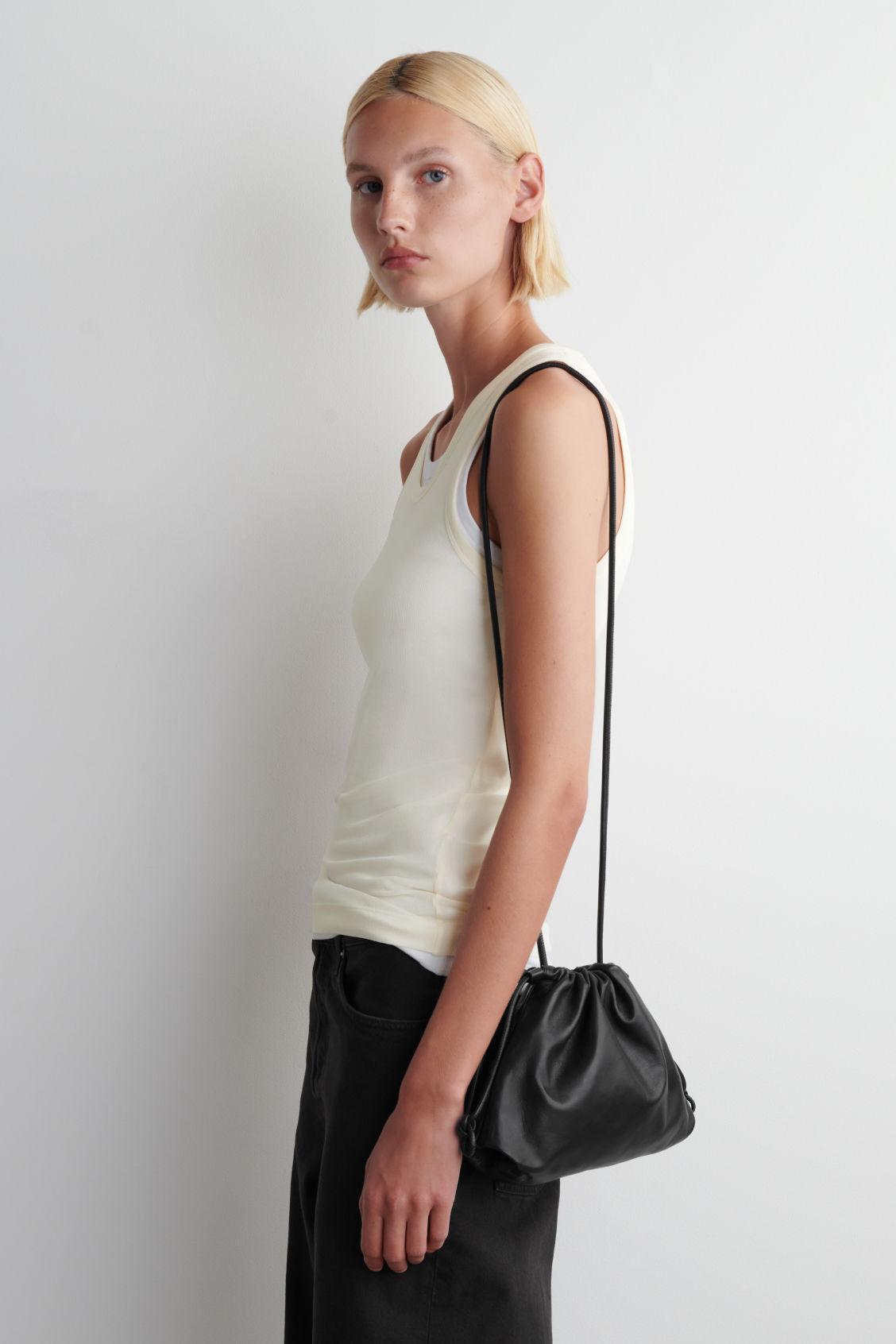 MINI CAVATELLI CLUTCH BAG - LEATHER Product Image