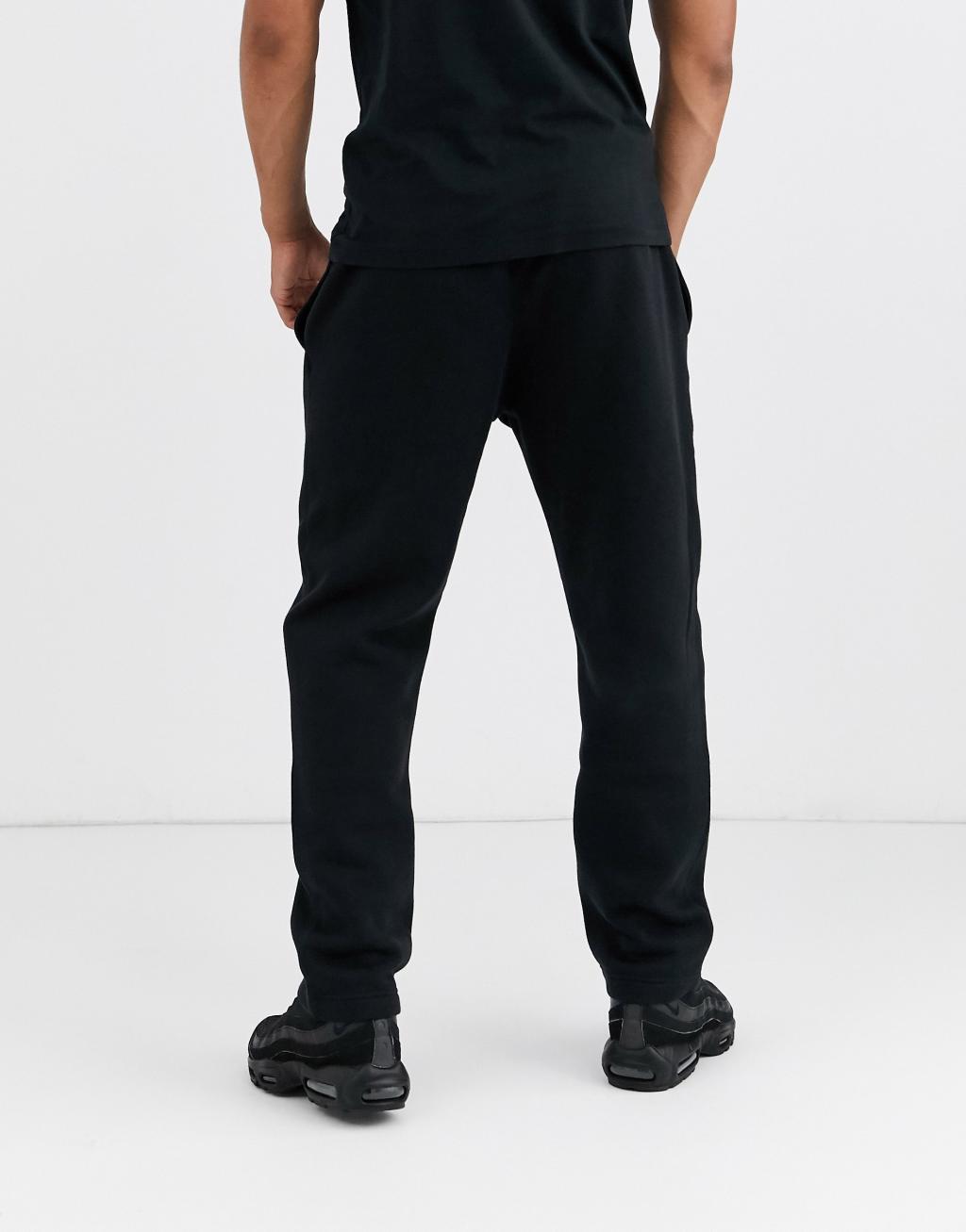 Nike Club straight fit sweatpants in black Product Image