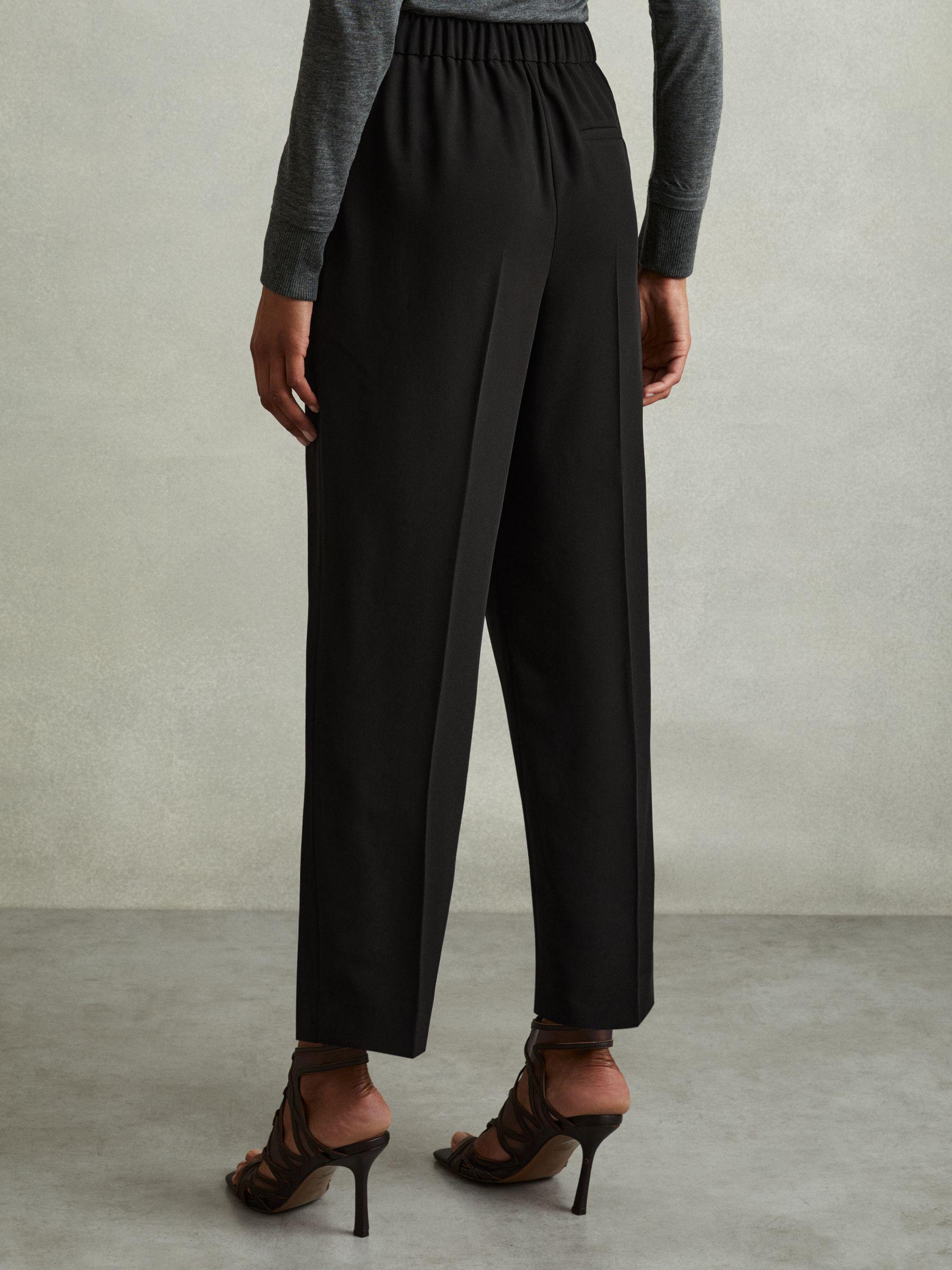 Petite Front Pleat Tapered Trousers in Black Product Image