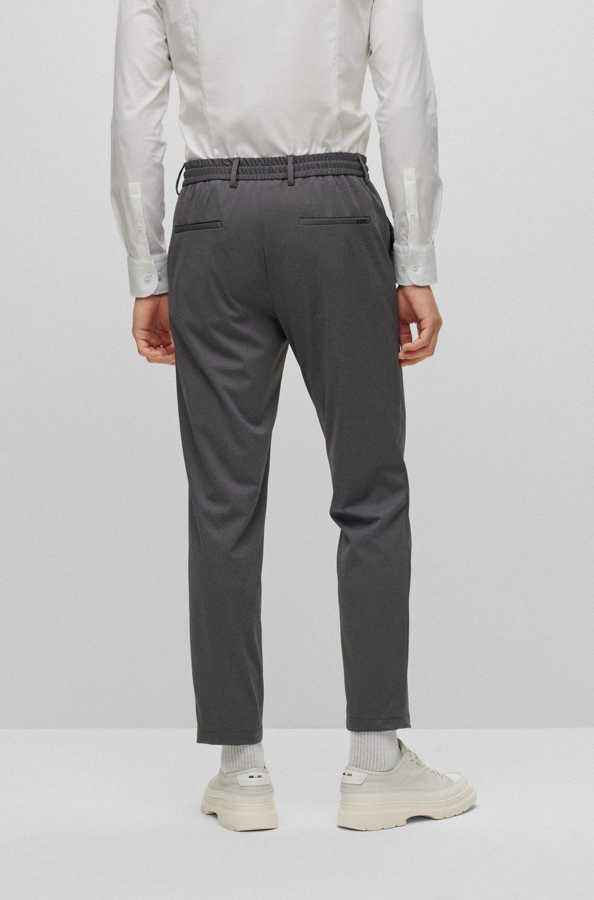 Slim-fit trousers in micro-patterned jersey  Product Image