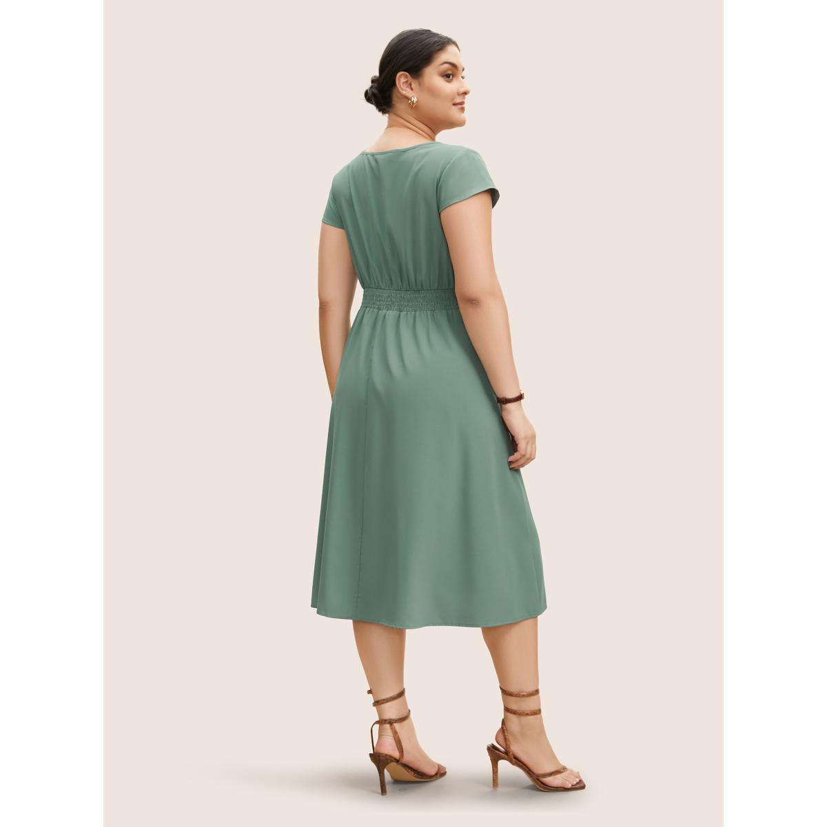 Plus Size Notched Collar Shirred Pleated Cap Sleeve Dress Emerald Women Work From Home Pleated Notched collar Cap Sleeve Curvy BloomChic 10/M Product Image