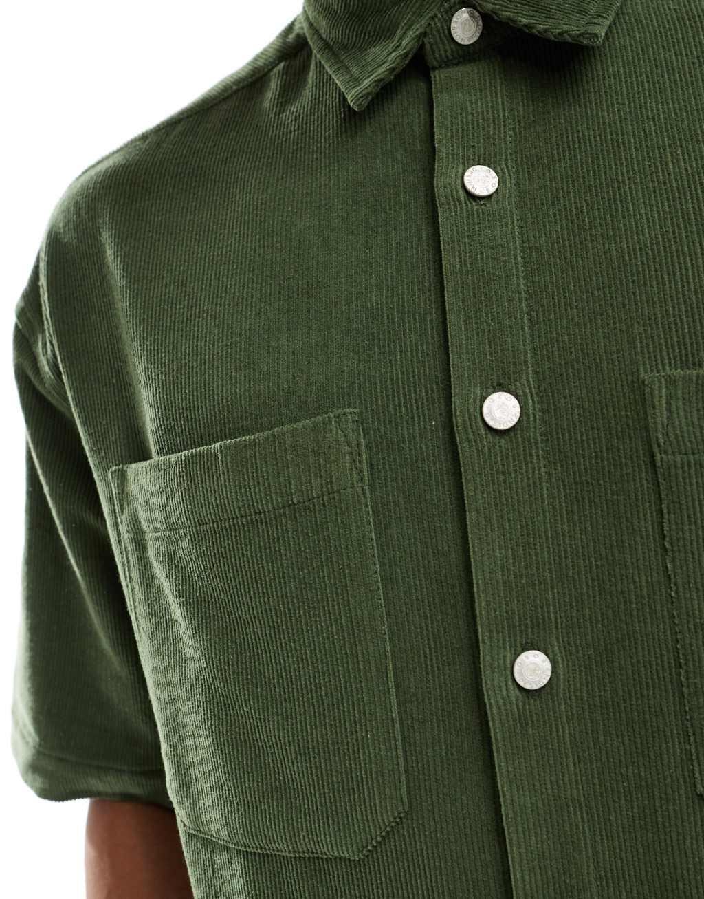 ASOS DESIGN short sleeve 90s oversized corduroy shirt in dark green Product Image