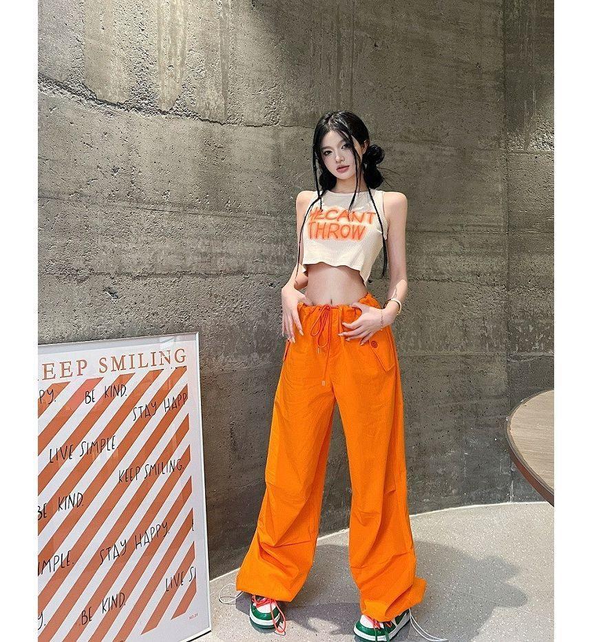 Round Neck Lettering Print Crop Tank Top / Drawstring Waist Plain Wide Leg Cargo Pants Product Image