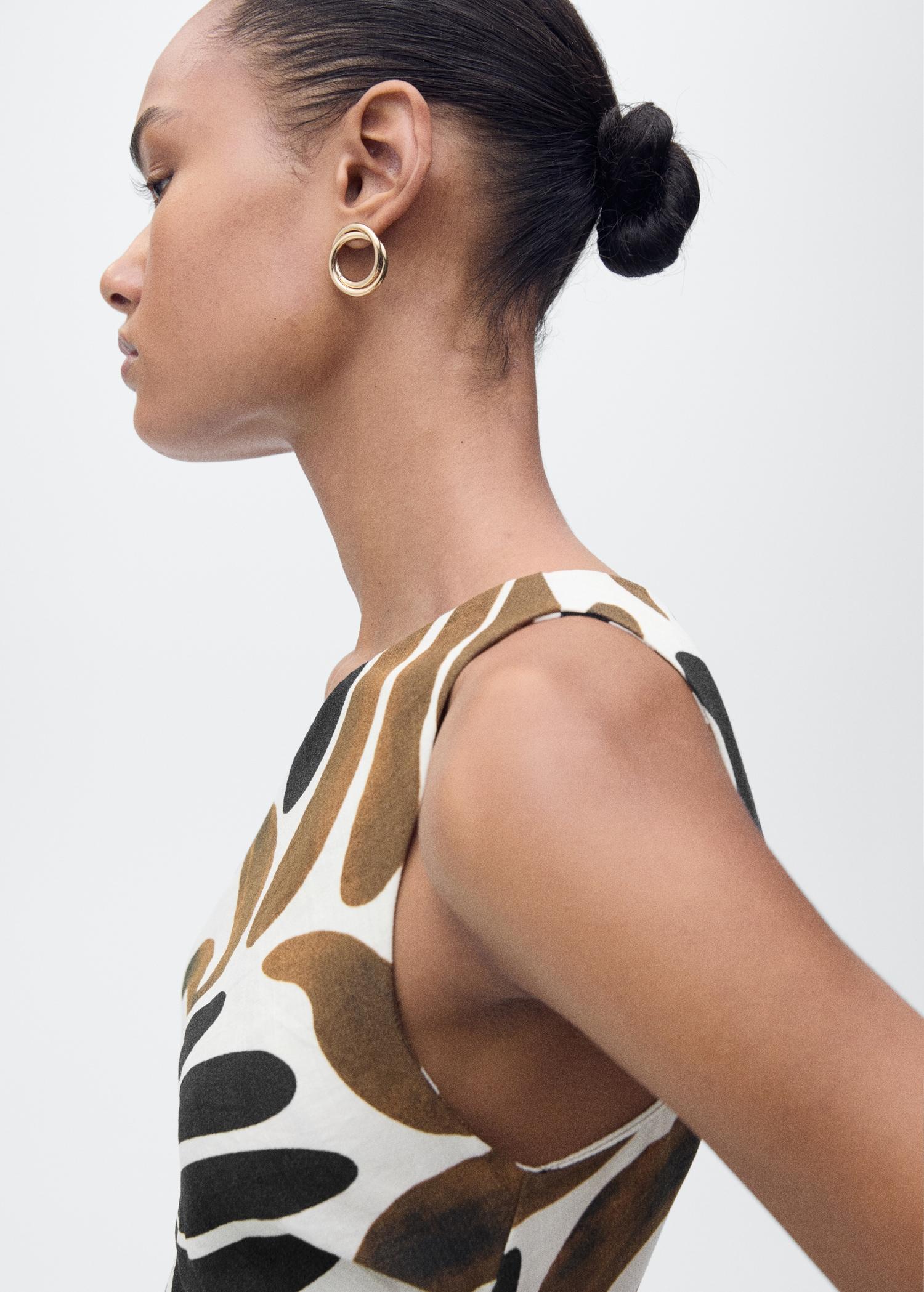 Printed dress with asymmetrical neck - Women | MANGO USA Product Image