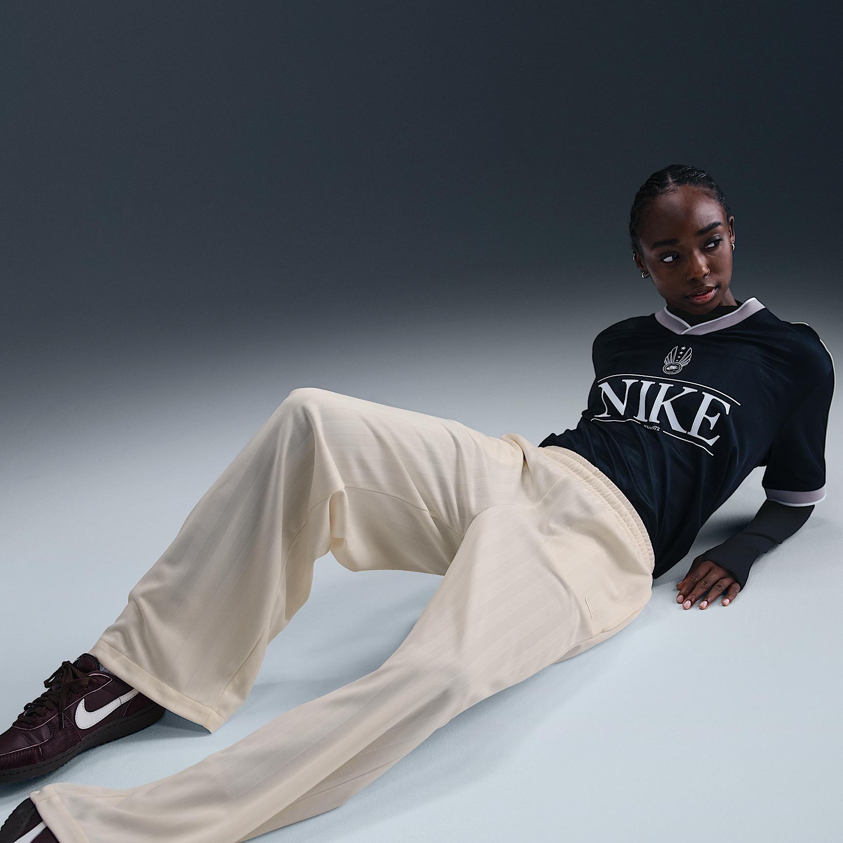 Nike Sportswear Women's Mid-Rise Loose Jacquard Striped Track Pants Product Image