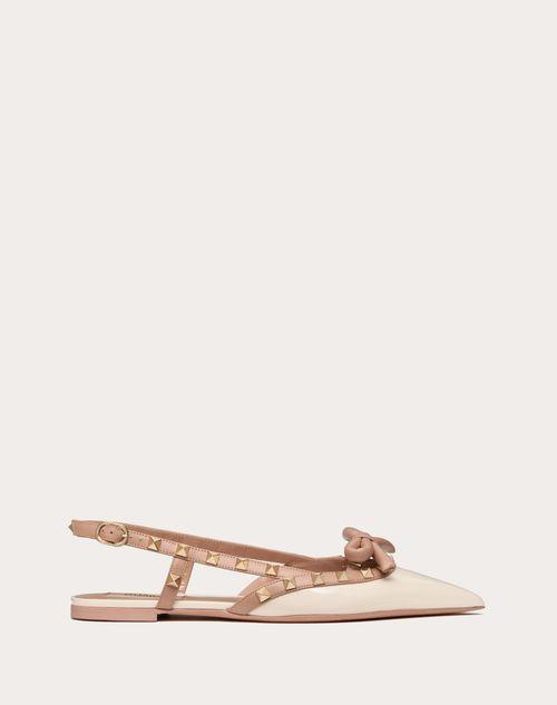 ROCKSTUD BOW SLINGBACK BALLERINAS IN PATENT LEATHER Product Image