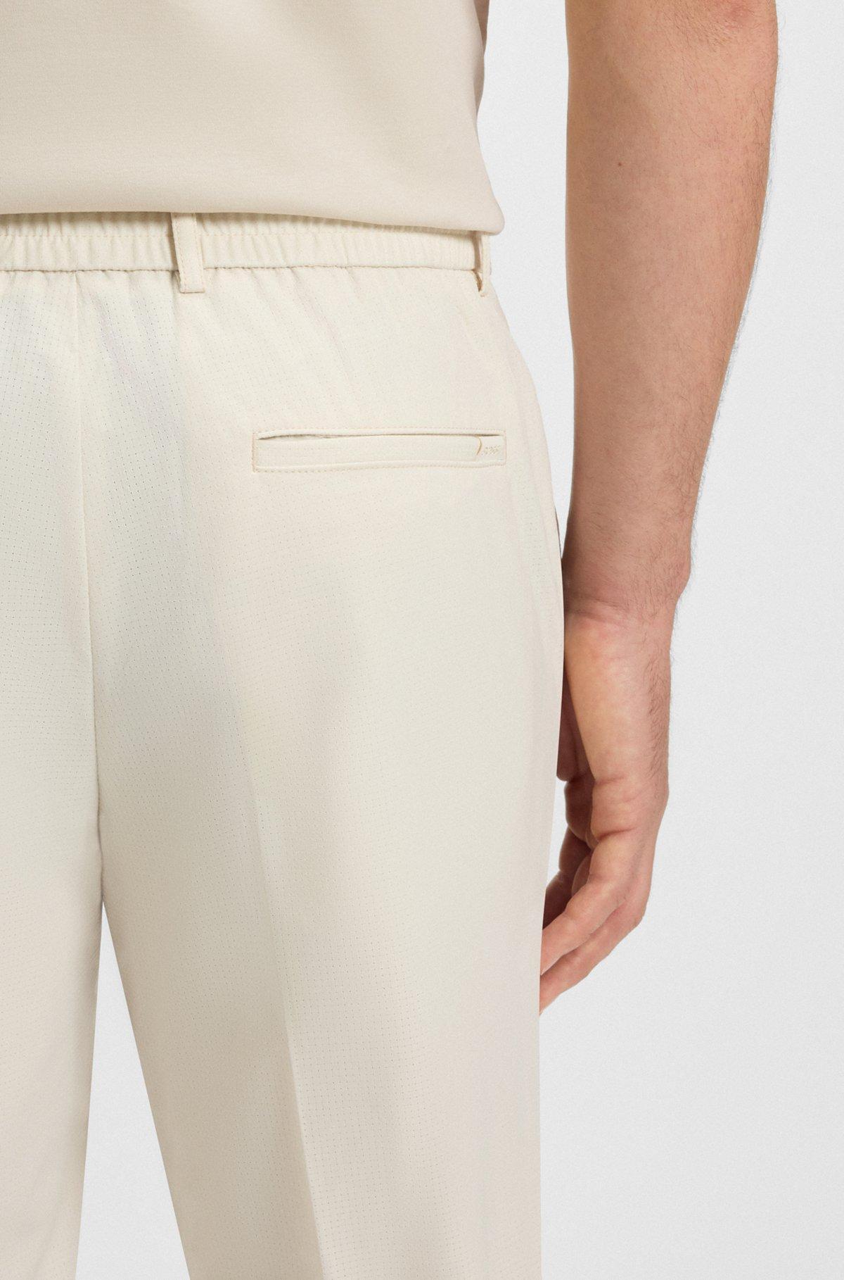 Packable trousers in water-repellent stretch fabric Product Image