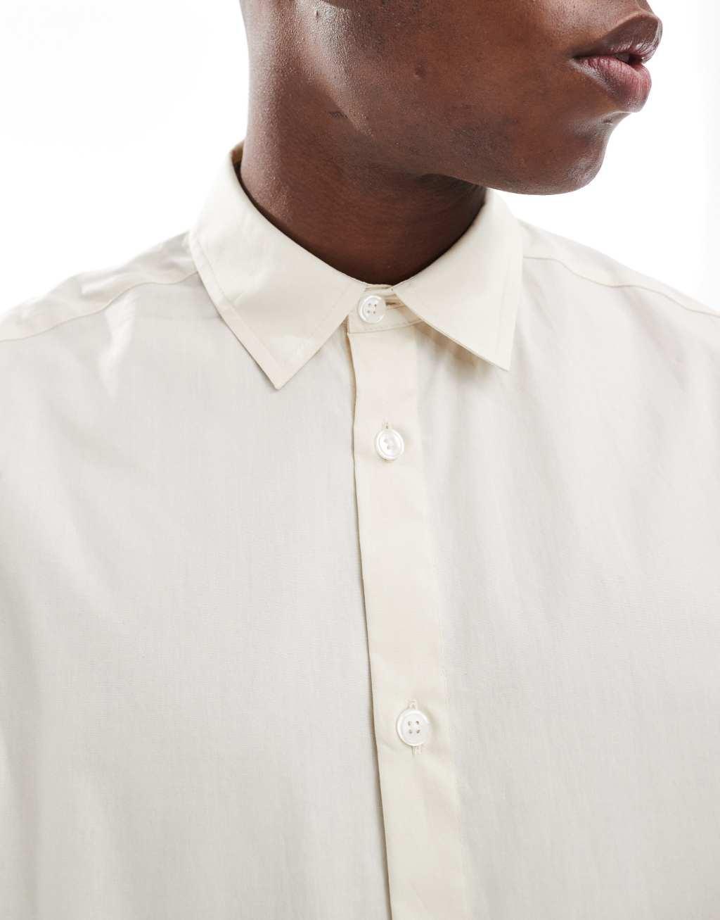 ASOS DESIGN oversized boxy shirt with large pockets in beige Product Image