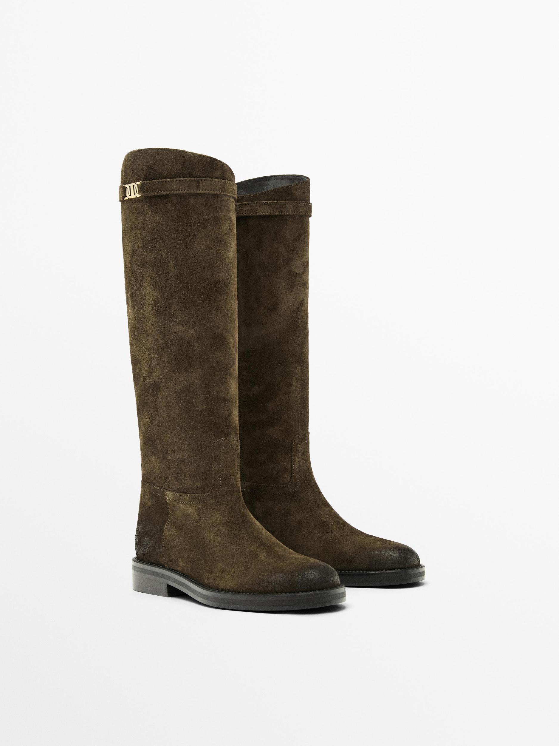 Oiled split suede riding boots Product Image