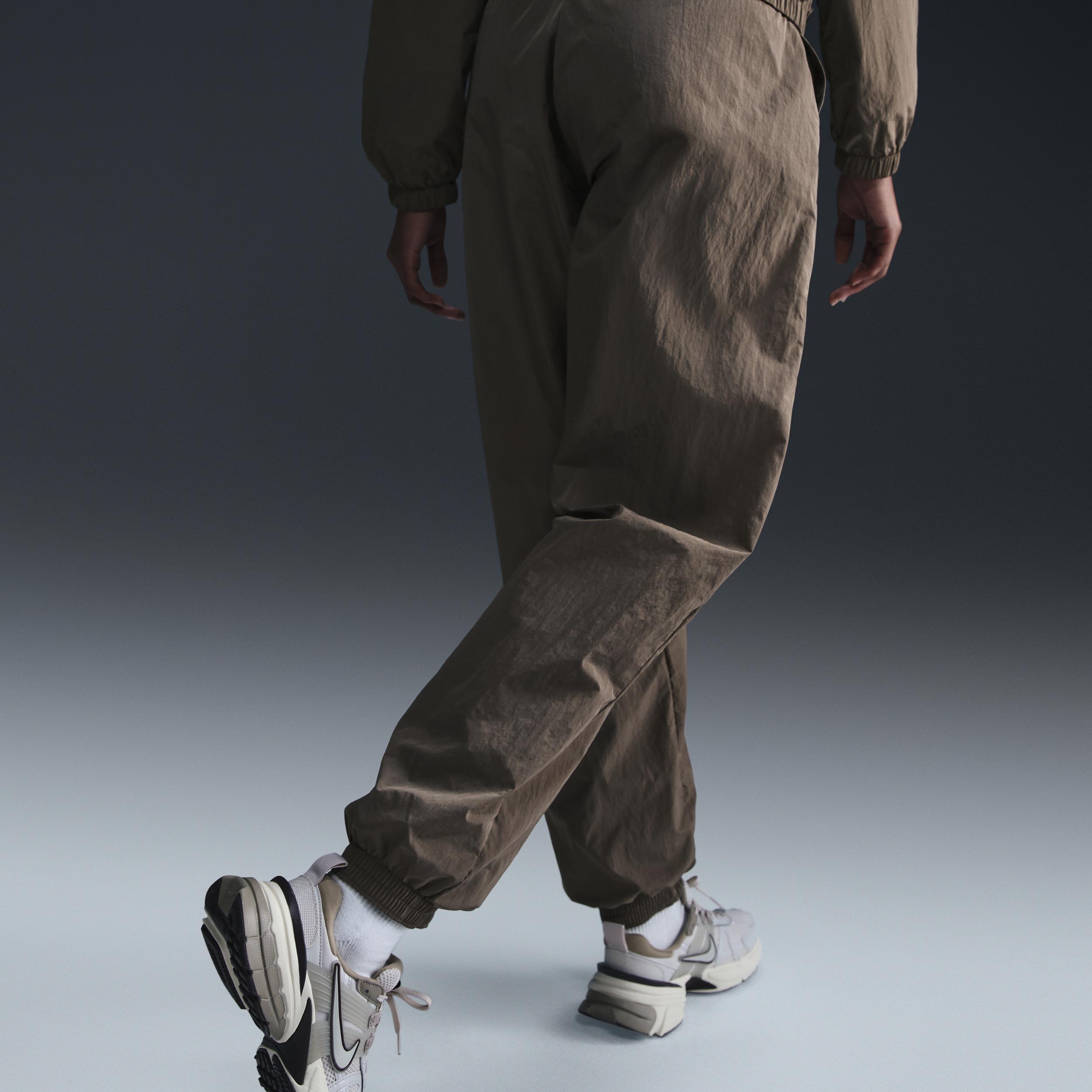 Nike Sportswear Essential Women's Mid-Rise Oversized Woven Joggers Product Image