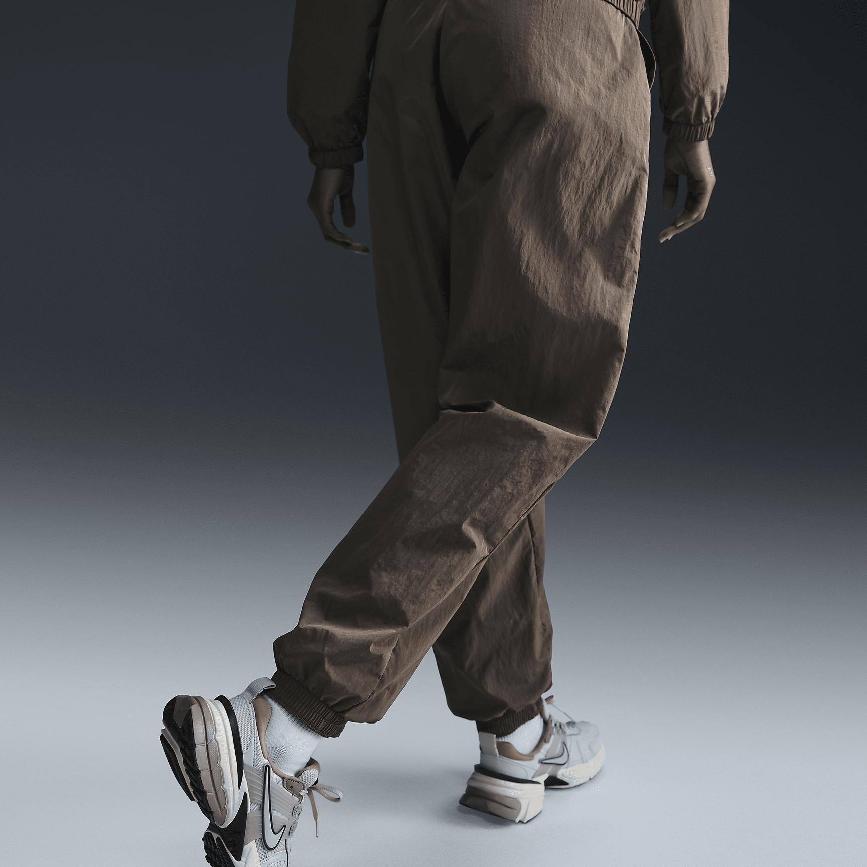 Nike Sportswear Essential Women's Mid-Rise Oversized Woven Joggers Product Image