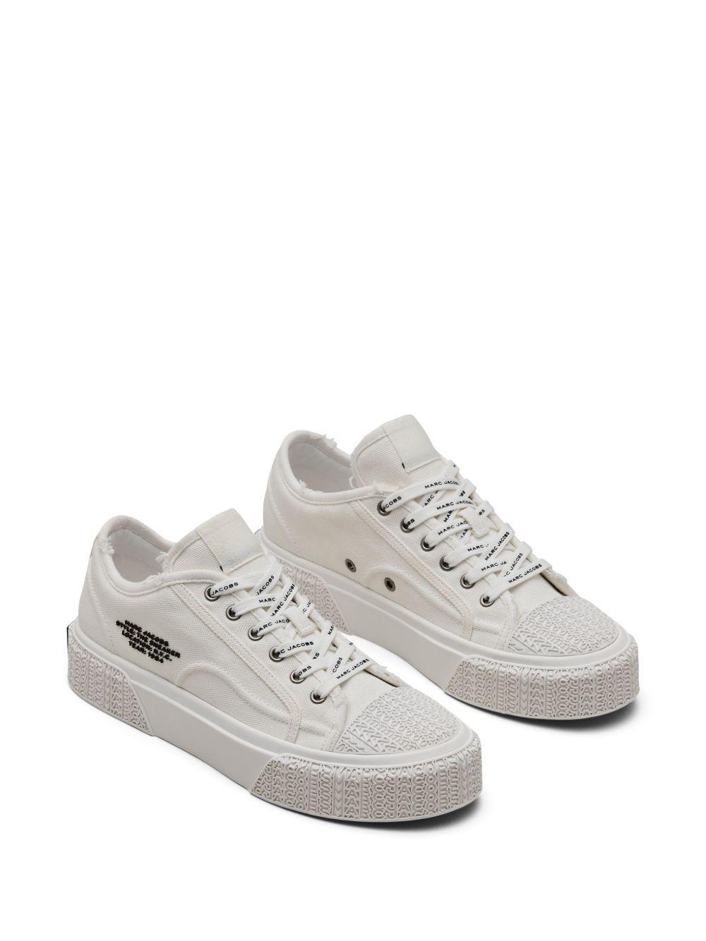 distressed canvas sneakers Product Image