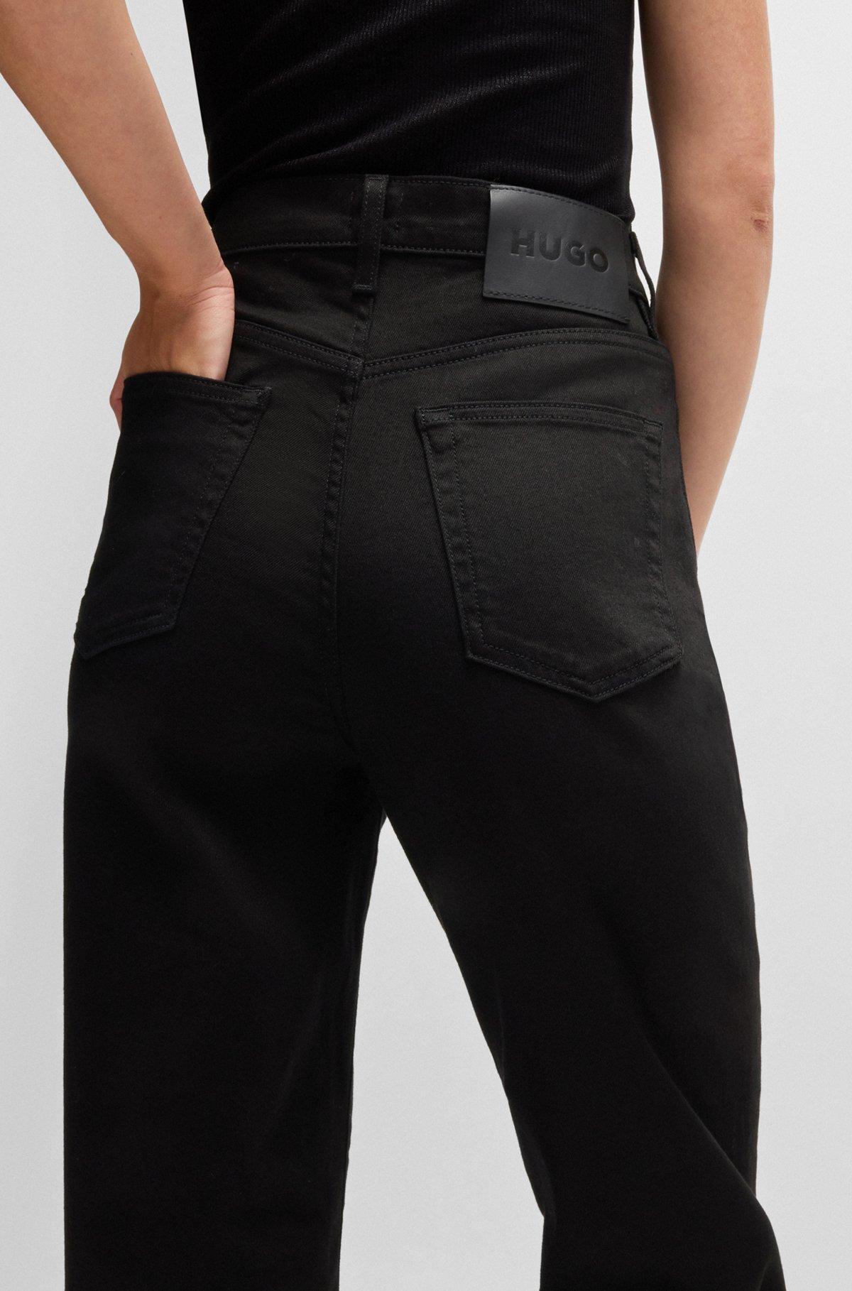 Slim-fit jeans in stay-black stretch denim Product Image