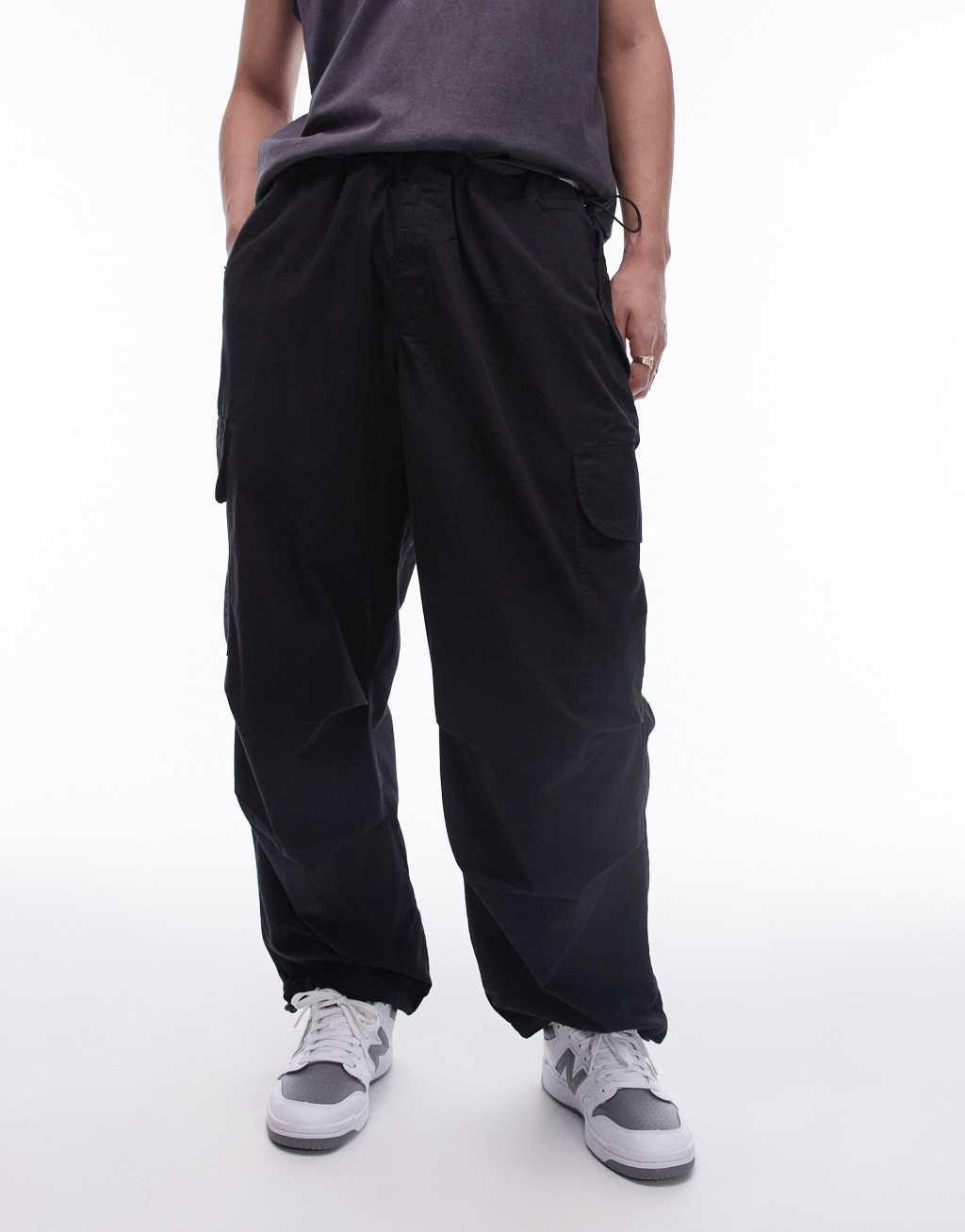 Topman wide cargo pants in black Product Image