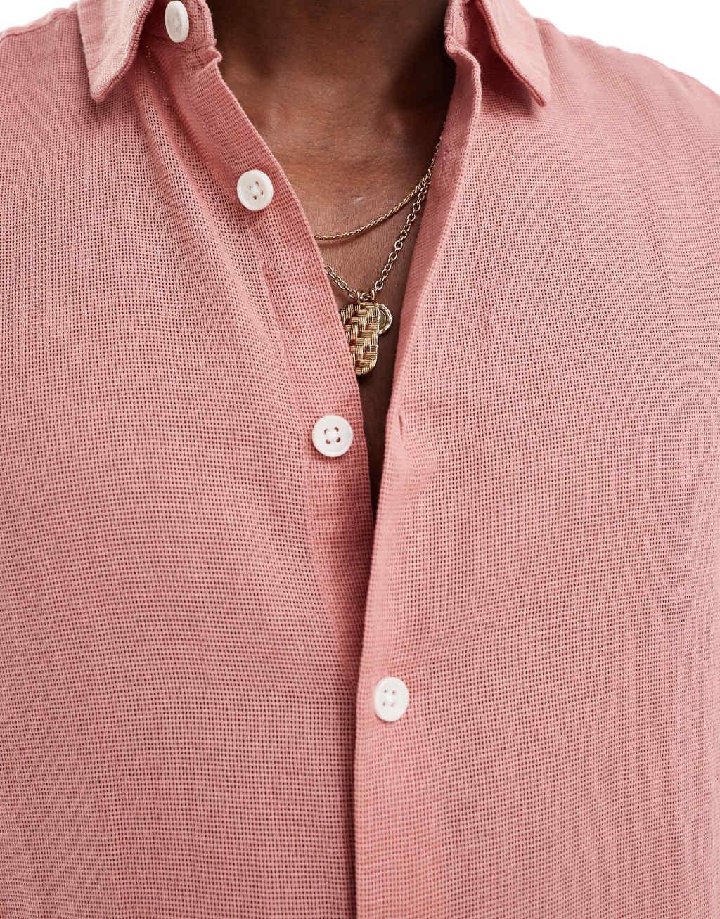 ASOS DESIGN relaxed textured shirt with patch pockets in pink Product Image
