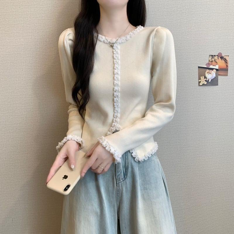 Long-Sleeve Round Neck Faux Pearl Accent Contrast Trim Slit Knit Top Product Image
