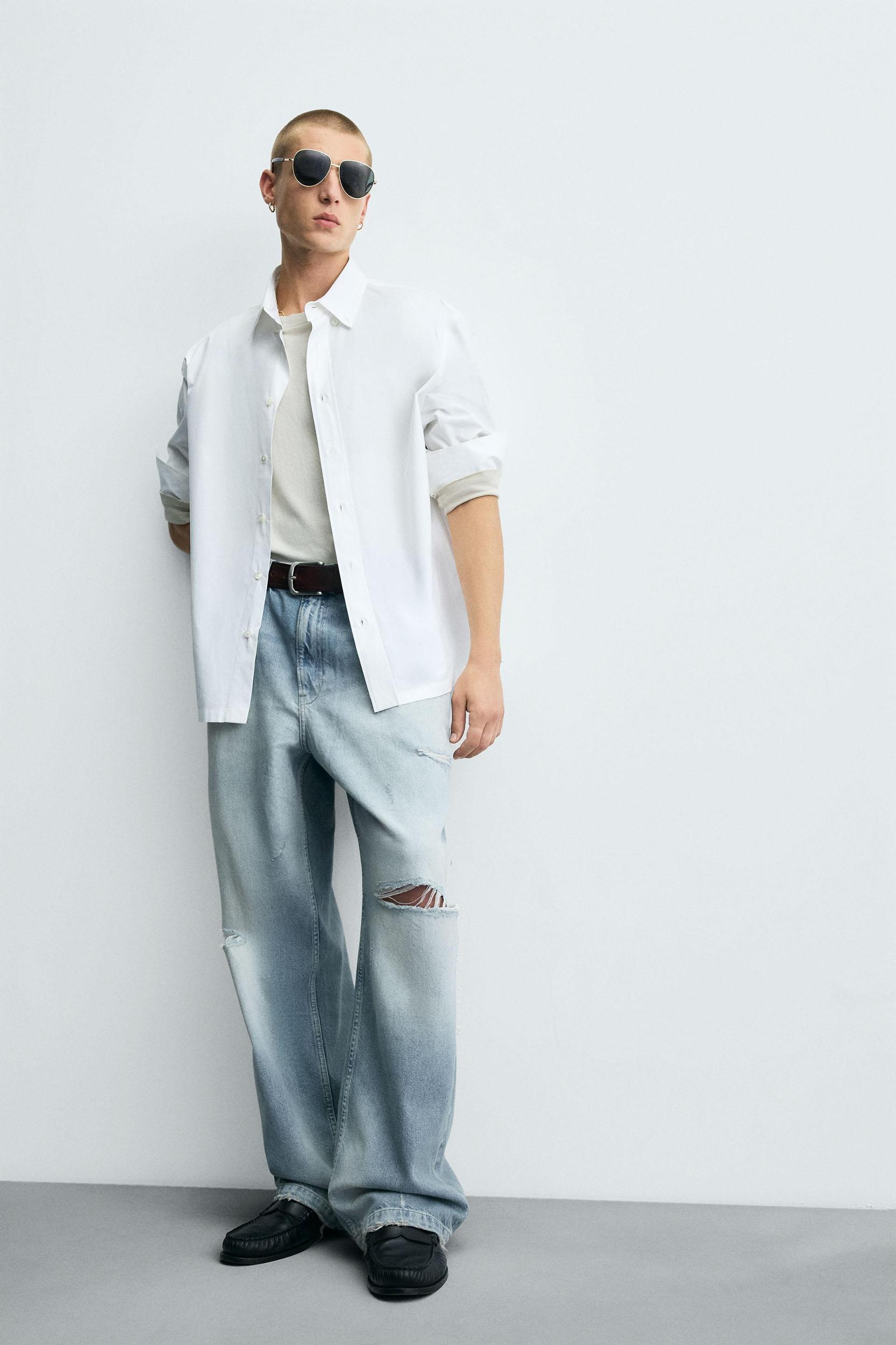 RIPPED BAGGY FIT JEANS Product Image