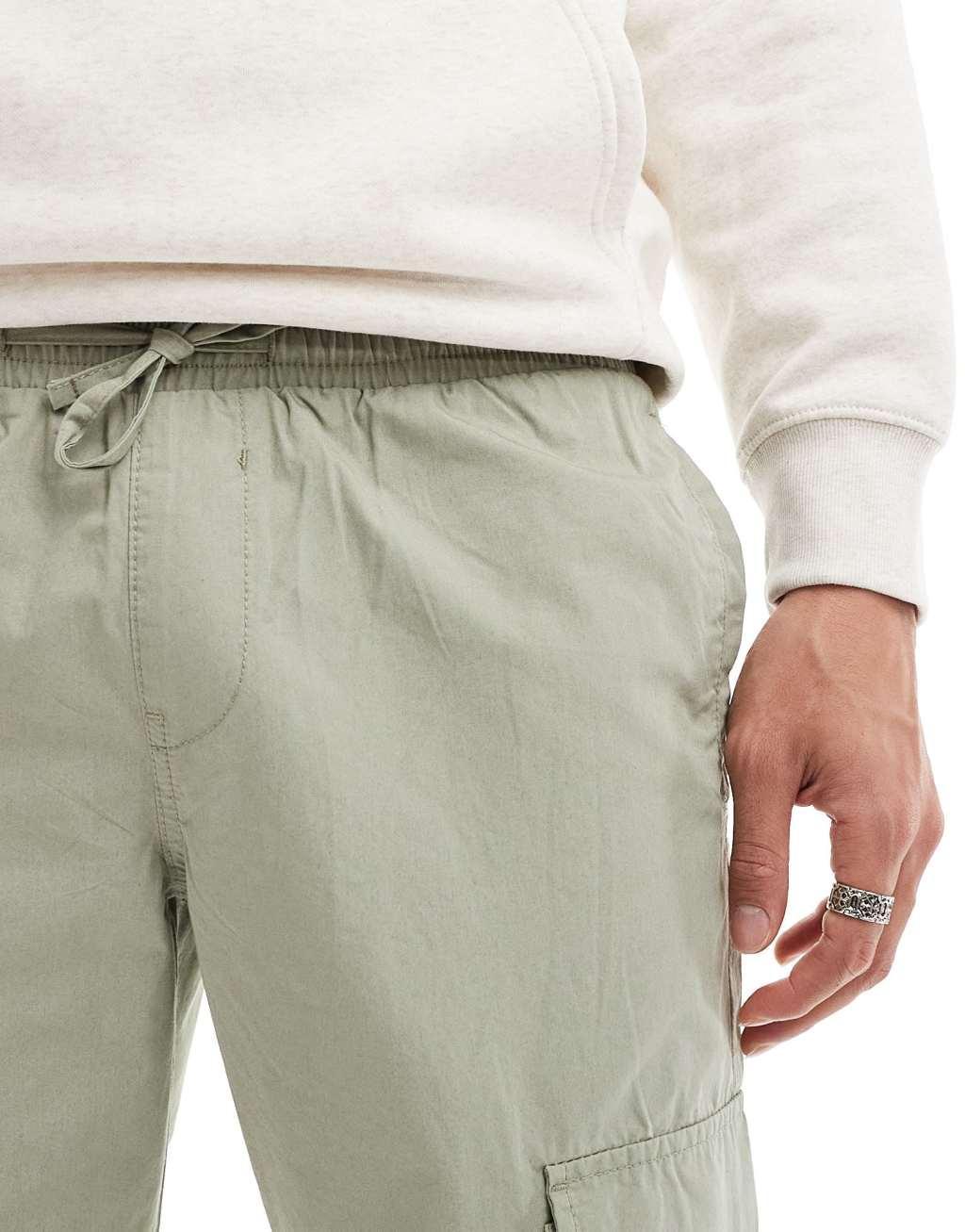 ASOS DESIGN tapered pull on pants in sage green Product Image