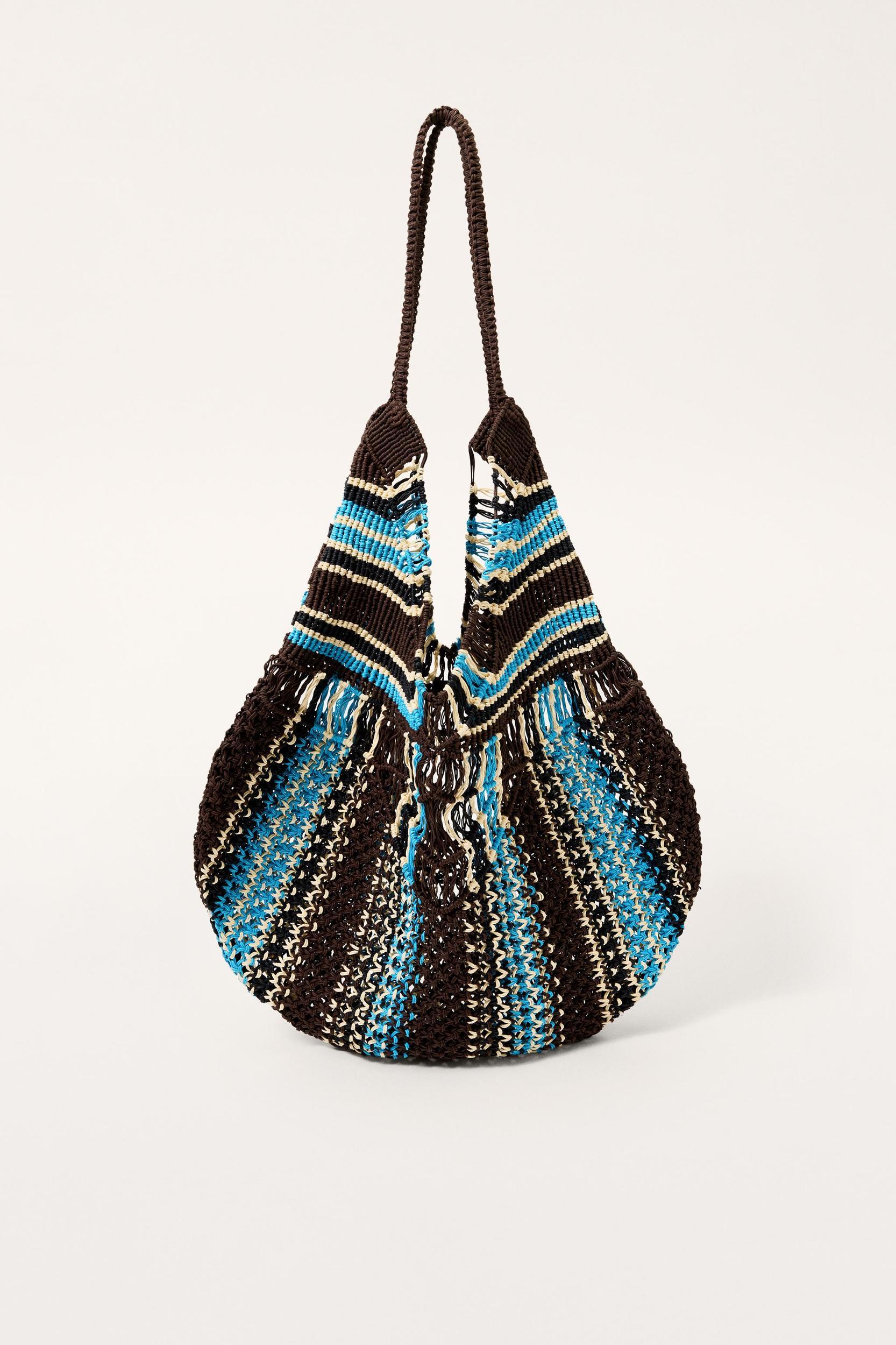 LIMITED EDITION STRIPED WOVEN MAXI BUCKET BAG Product Image