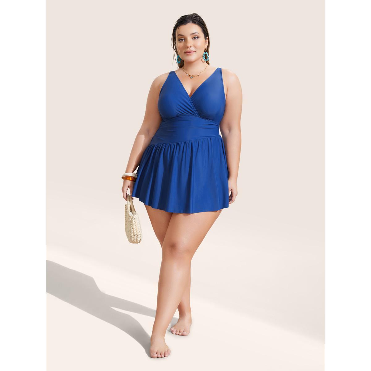 Plus Size Solid Surplice Neck Gathered Swim Dress Women's Swimwear Indigo Beach Bodycon V-neck High stretch Curve Swim Dresses BloomChic 22-24/3X Product Image