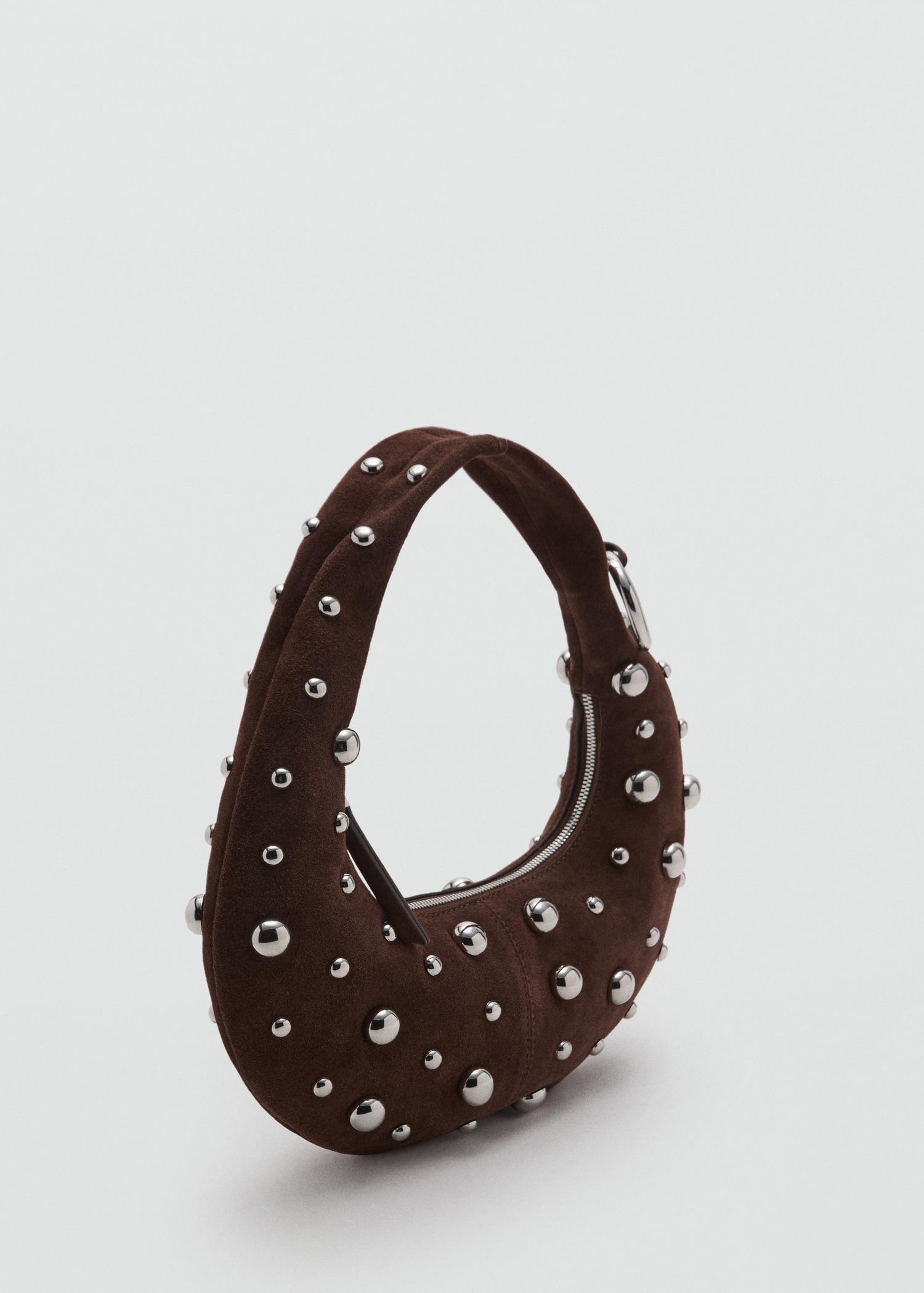 Leather handbag with metallic-balls appliqué - Women | MANGO USA Product Image