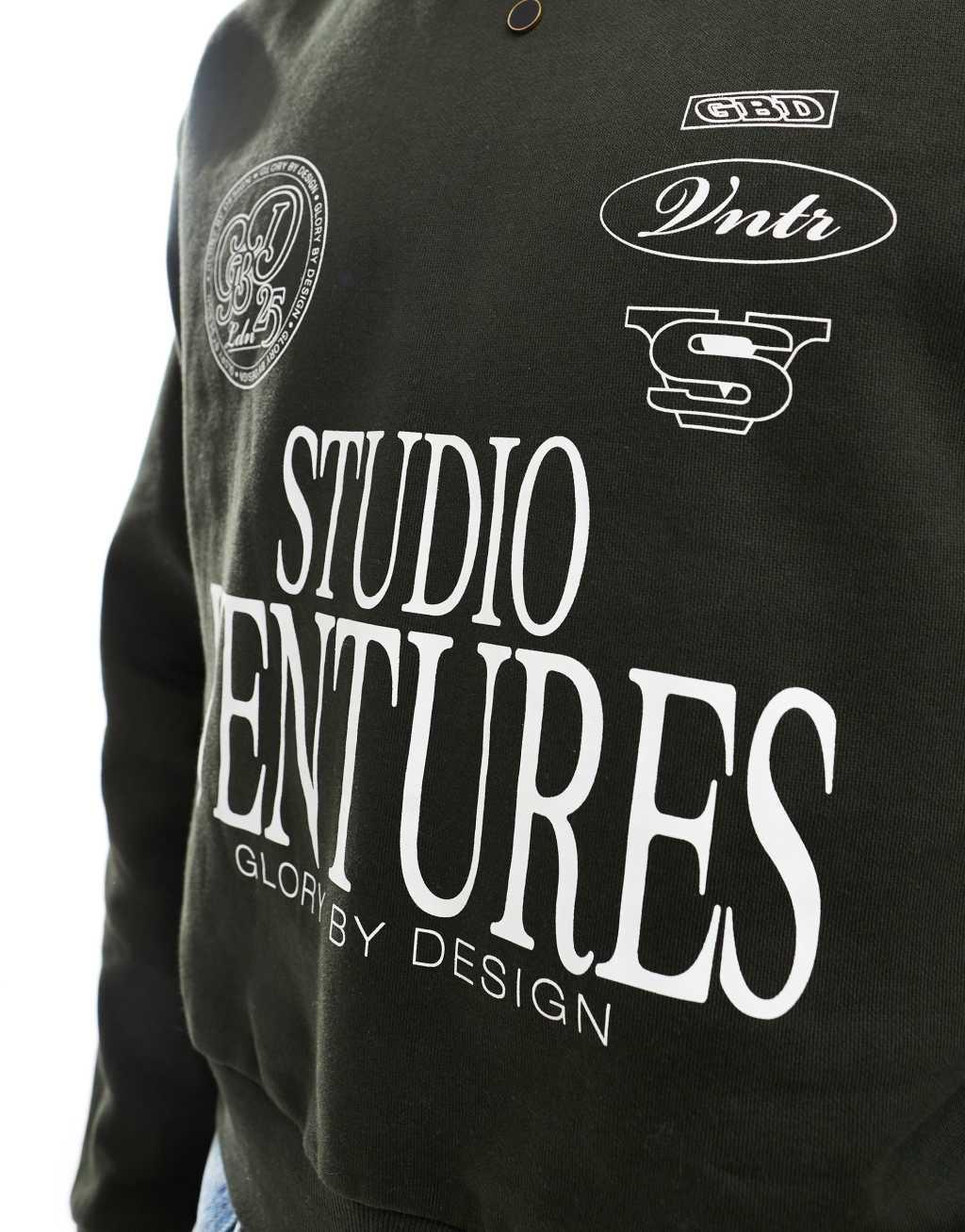 ASOS DESIGN oversized drop shoulder sweatshirt with studio ventures print in green Product Image
