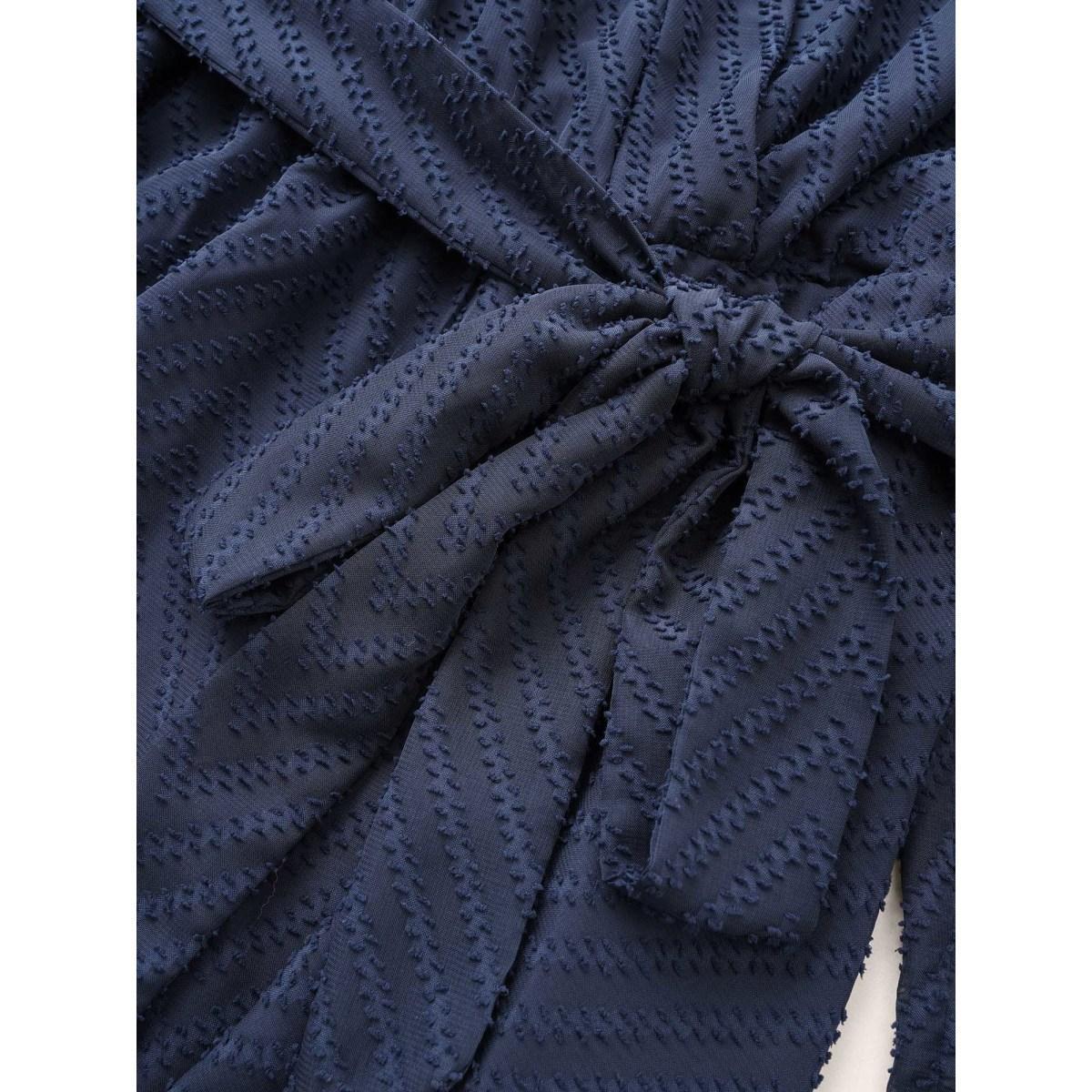 Plus Size Indigo Plain Textured High Low Hem Ties Blouse Women Office Long Sleeve Overlap Collar Work Blouses BloomChic 12/L Product Image